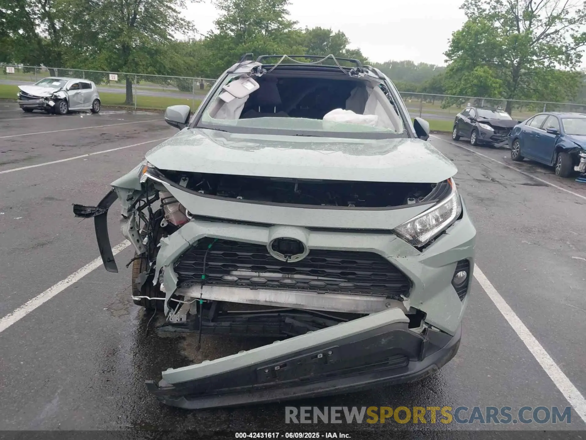 12 fotografías del automóvil dañado JTMP1RFV8MD070024 TOYOTA RAV4 2021