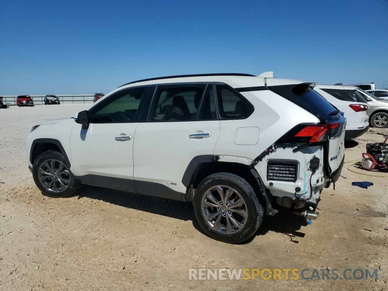 2 fotografías del automóvil dañado JTMD6RFV2ND055492 TOYOTA RAV4 2022