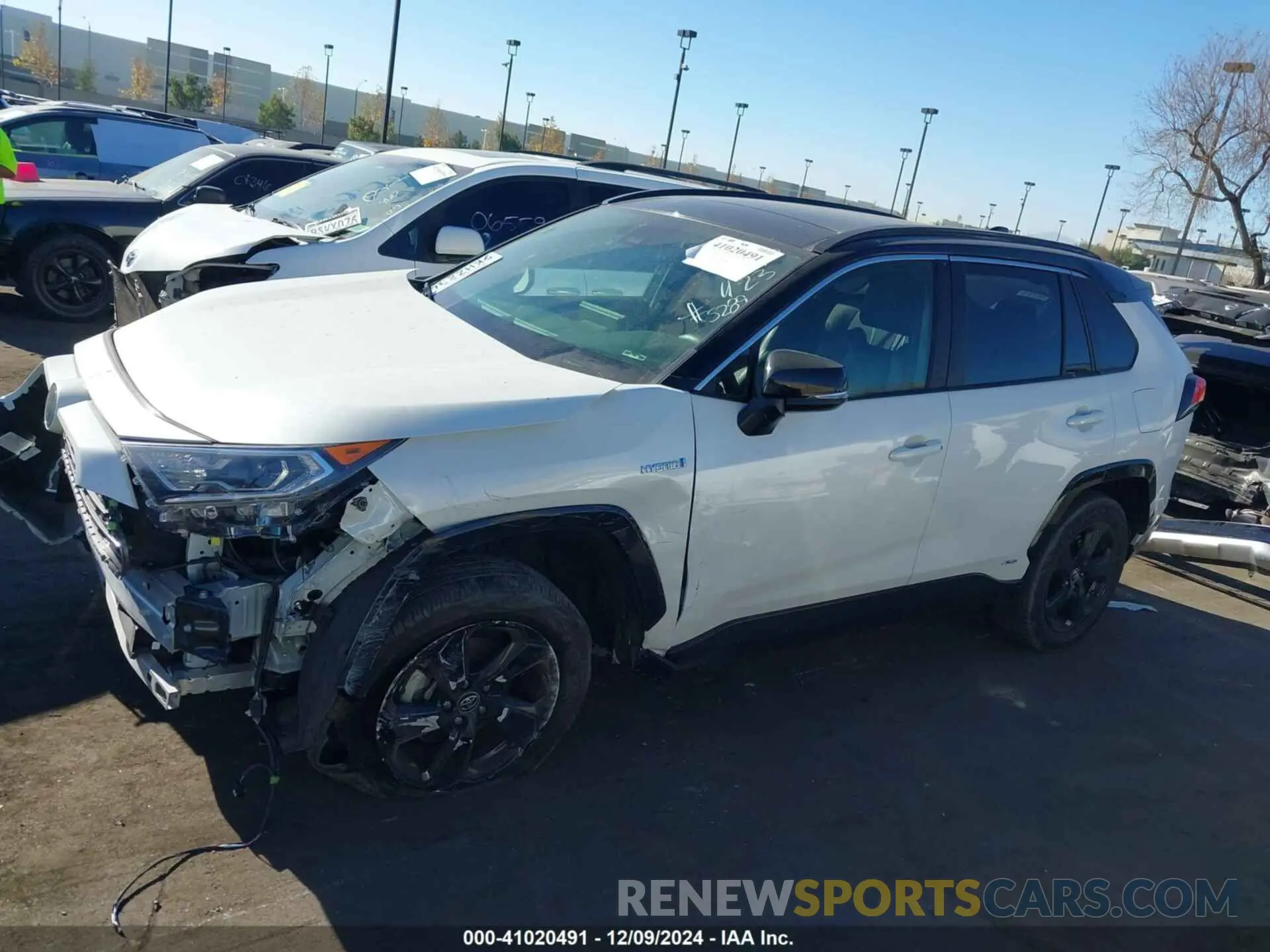 14 fotografías del automóvil dañado JTMEWRFVXKD505289 TOYOTA RAV4 HYBRID 2019