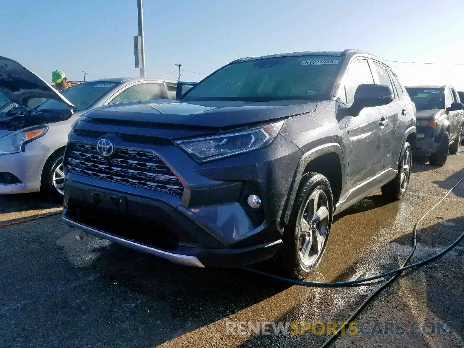 2 fotografías del automóvil dañado JTMDWRFV4KD505560 TOYOTA RAV4 LIMIT 2019