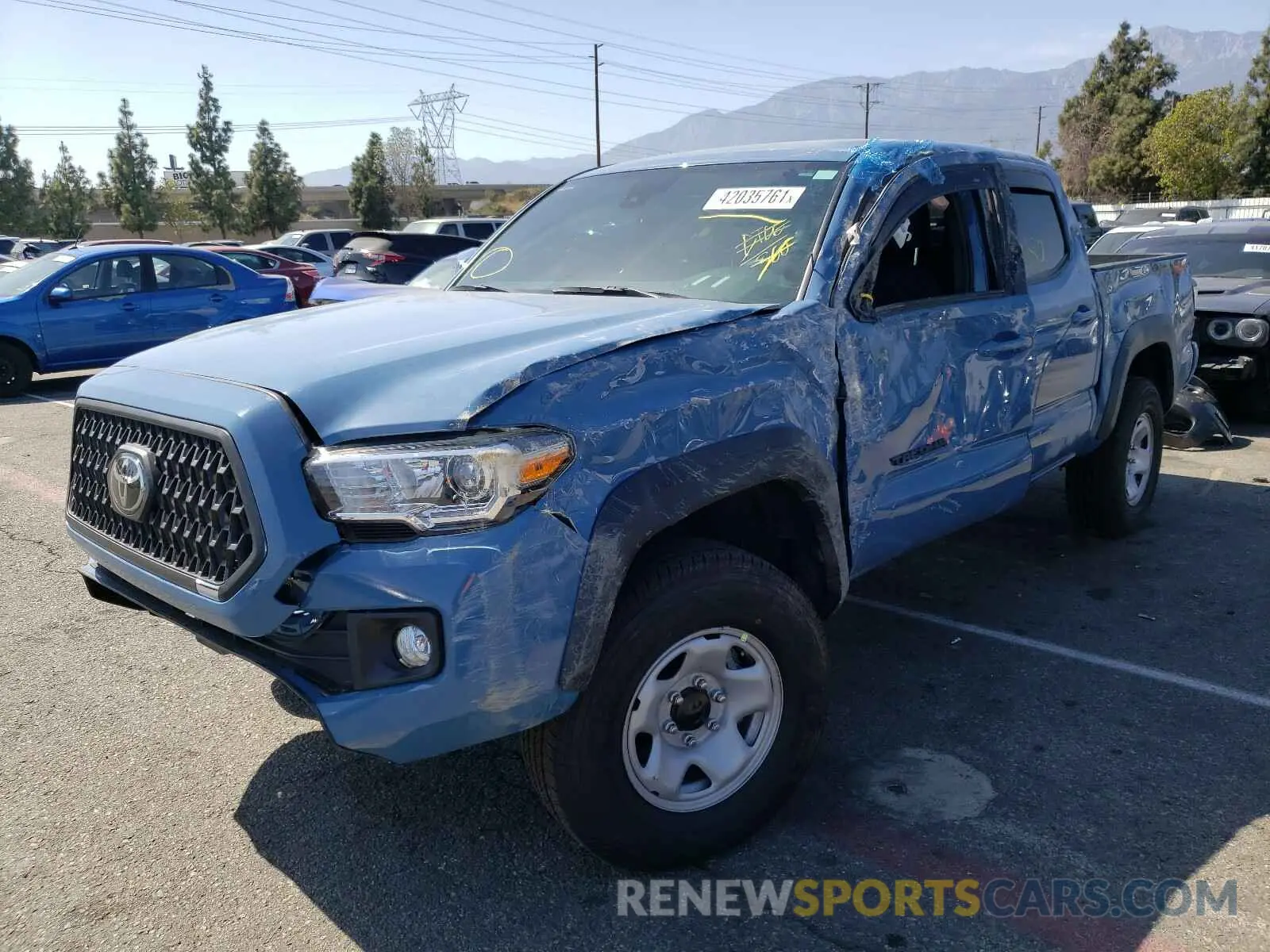 2 fotografías del automóvil dañado 3TMCZ5AN6KM276421 TOYOTA TACOMA 2019