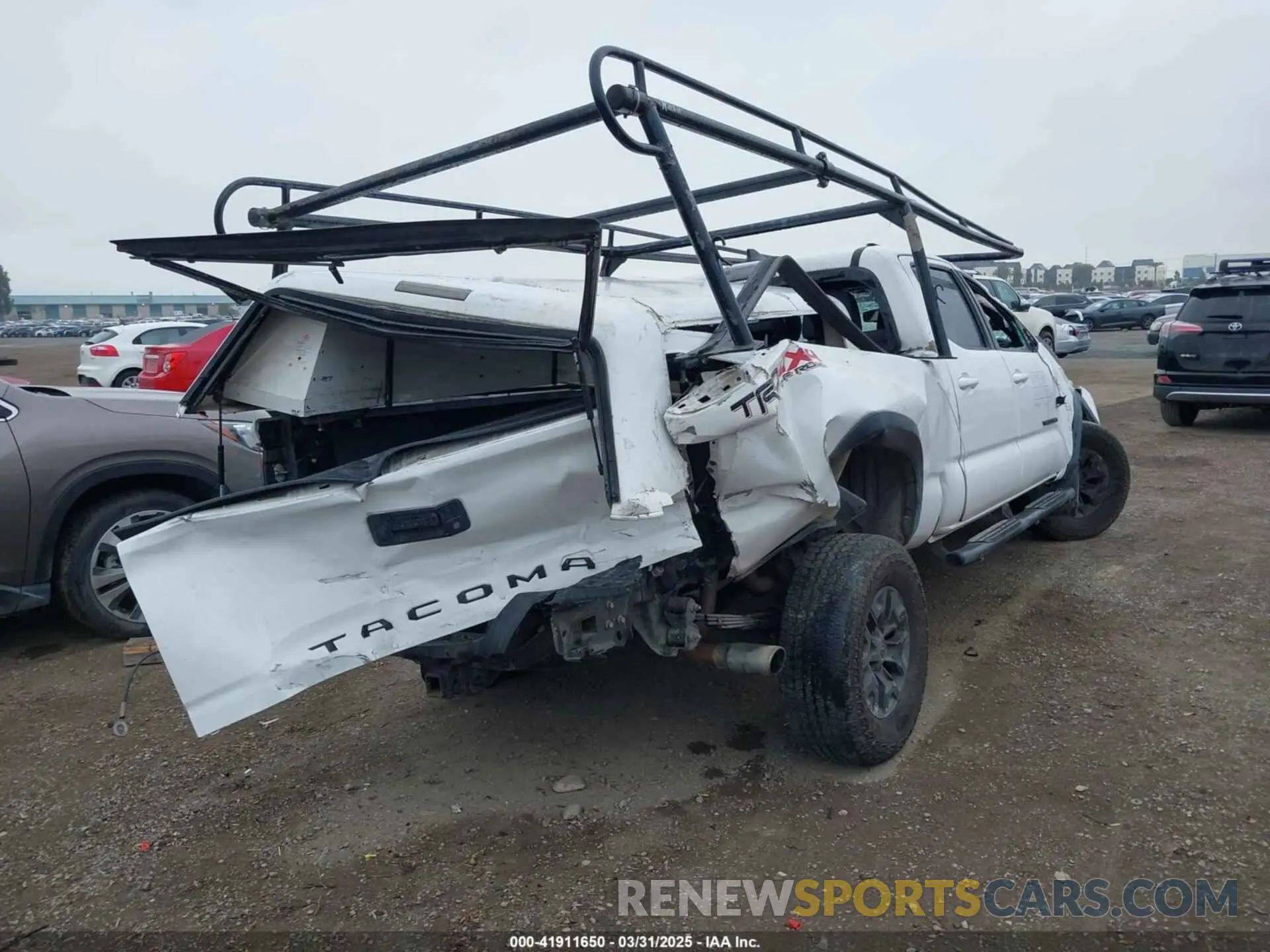 4 fotografías del automóvil dañado 3TMDZ5BN0KM069526 TOYOTA TACOMA 2019