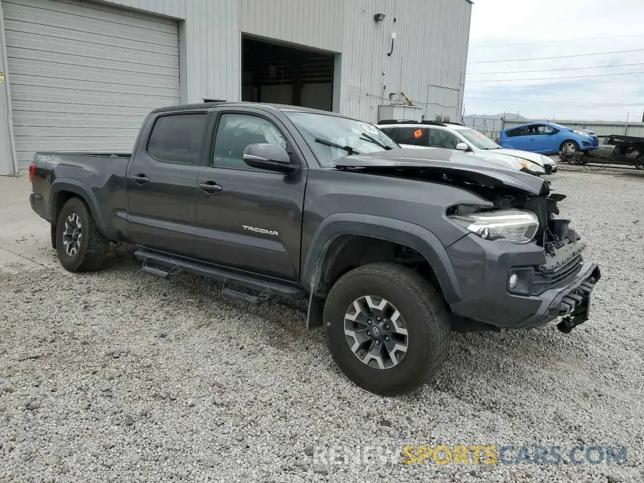 4 fotografías del automóvil dañado 3TMDZ5BN1KM057823 TOYOTA TACOMA 2019