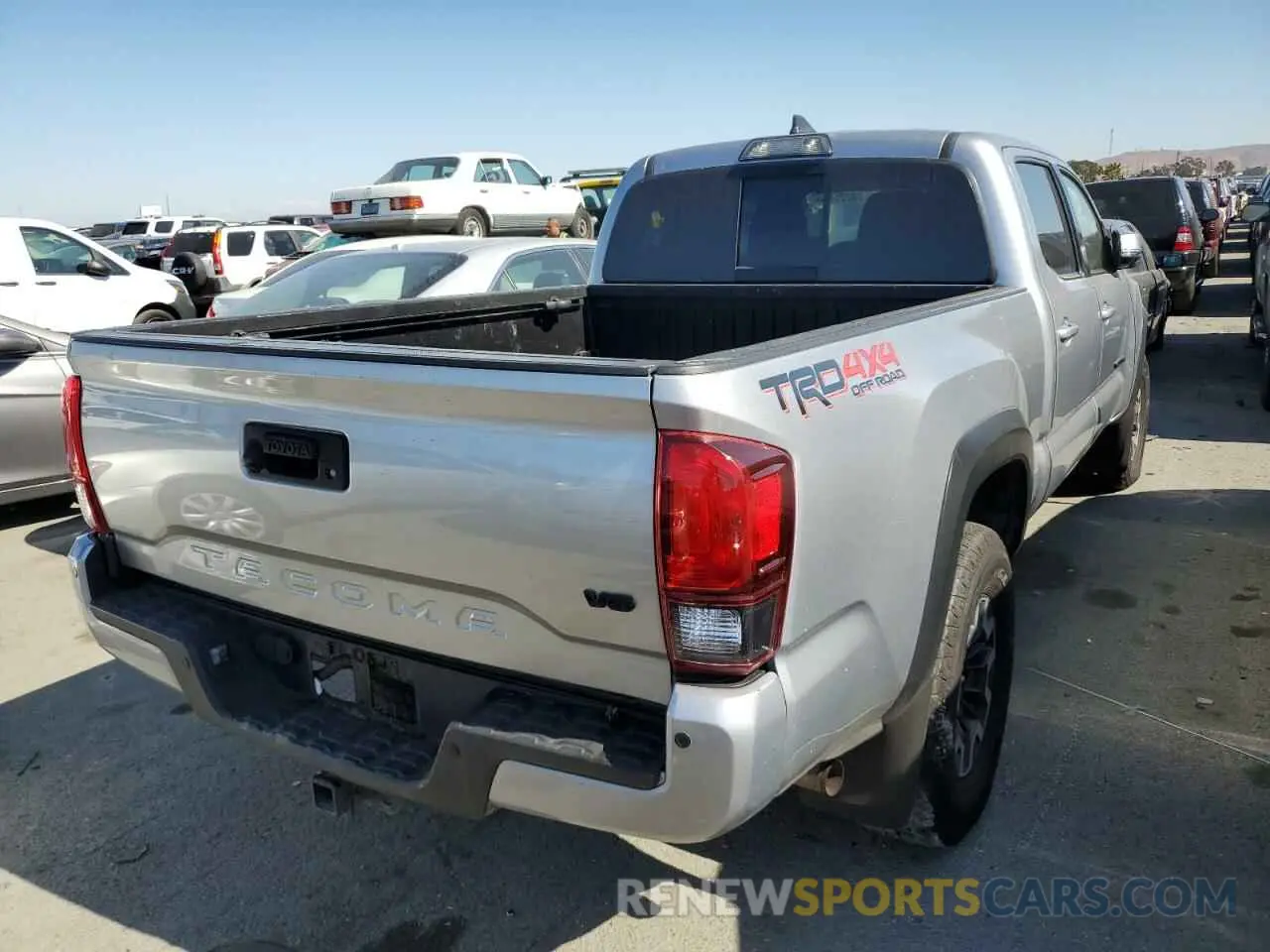 4 fotografías del automóvil dañado 3TMDZ5BN2KM055191 TOYOTA TACOMA 2019