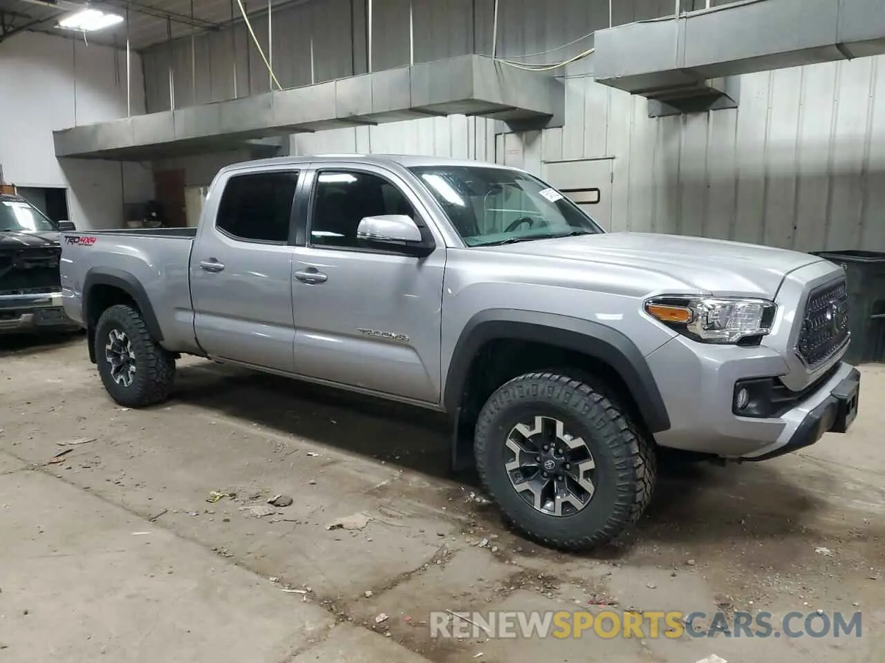 4 fotografías del automóvil dañado 3TMDZ5BN2KM059614 TOYOTA TACOMA 2019