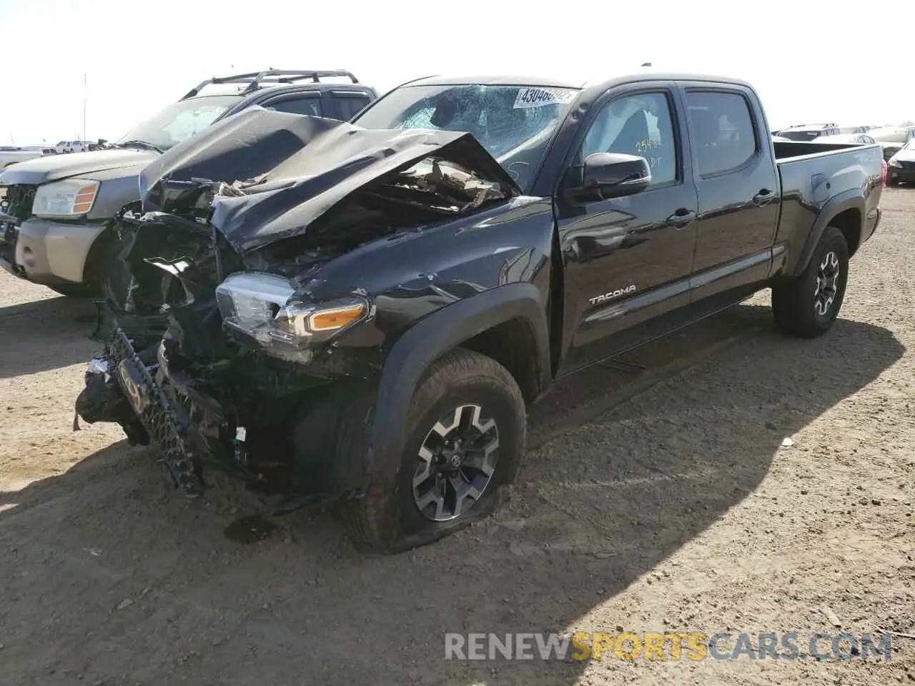 2 fotografías del automóvil dañado 3TMDZ5BN3KM068595 TOYOTA TACOMA 2019