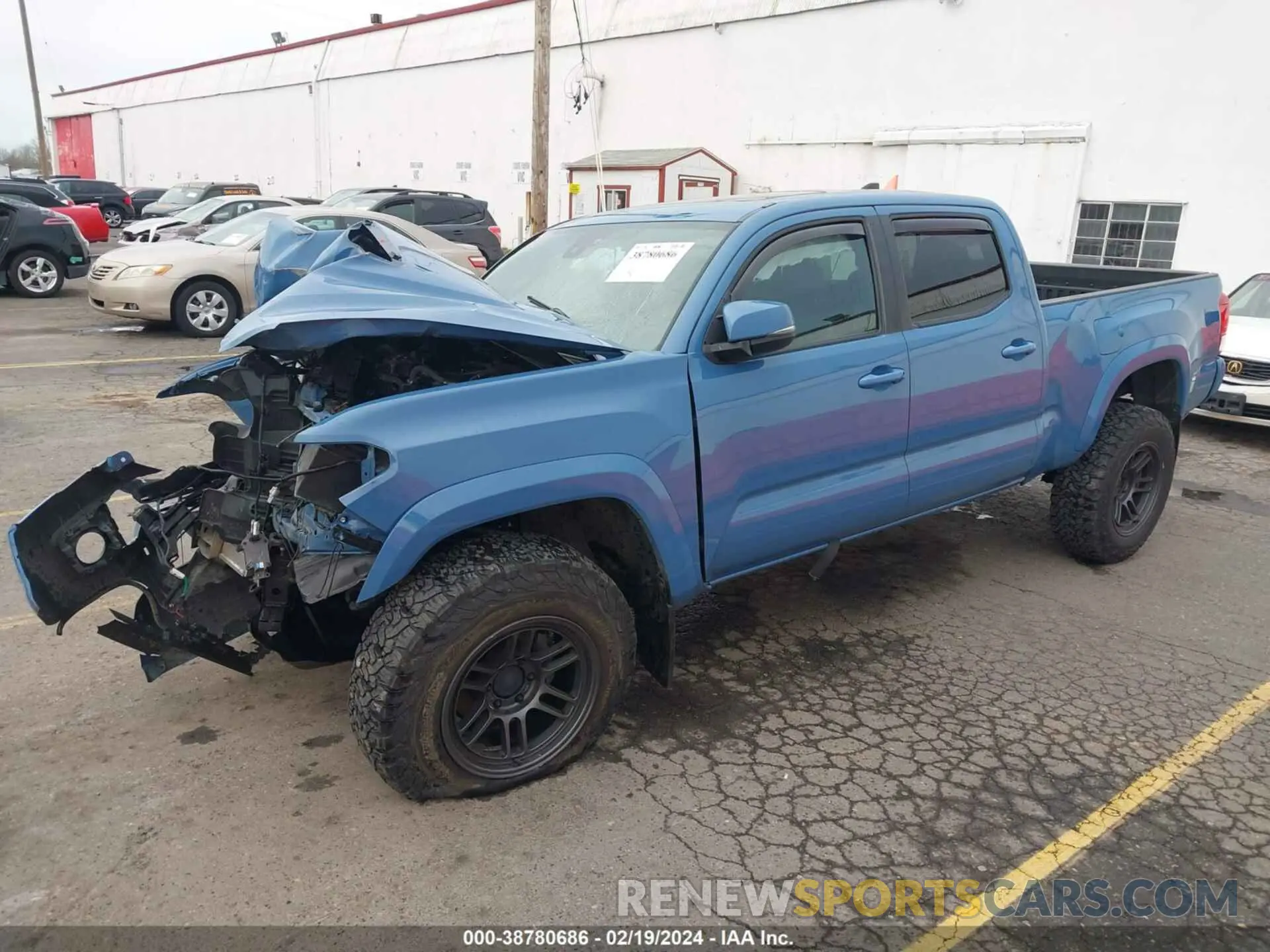2 fotografías del automóvil dañado 3TMDZ5BN3KM075269 TOYOTA TACOMA 2019
