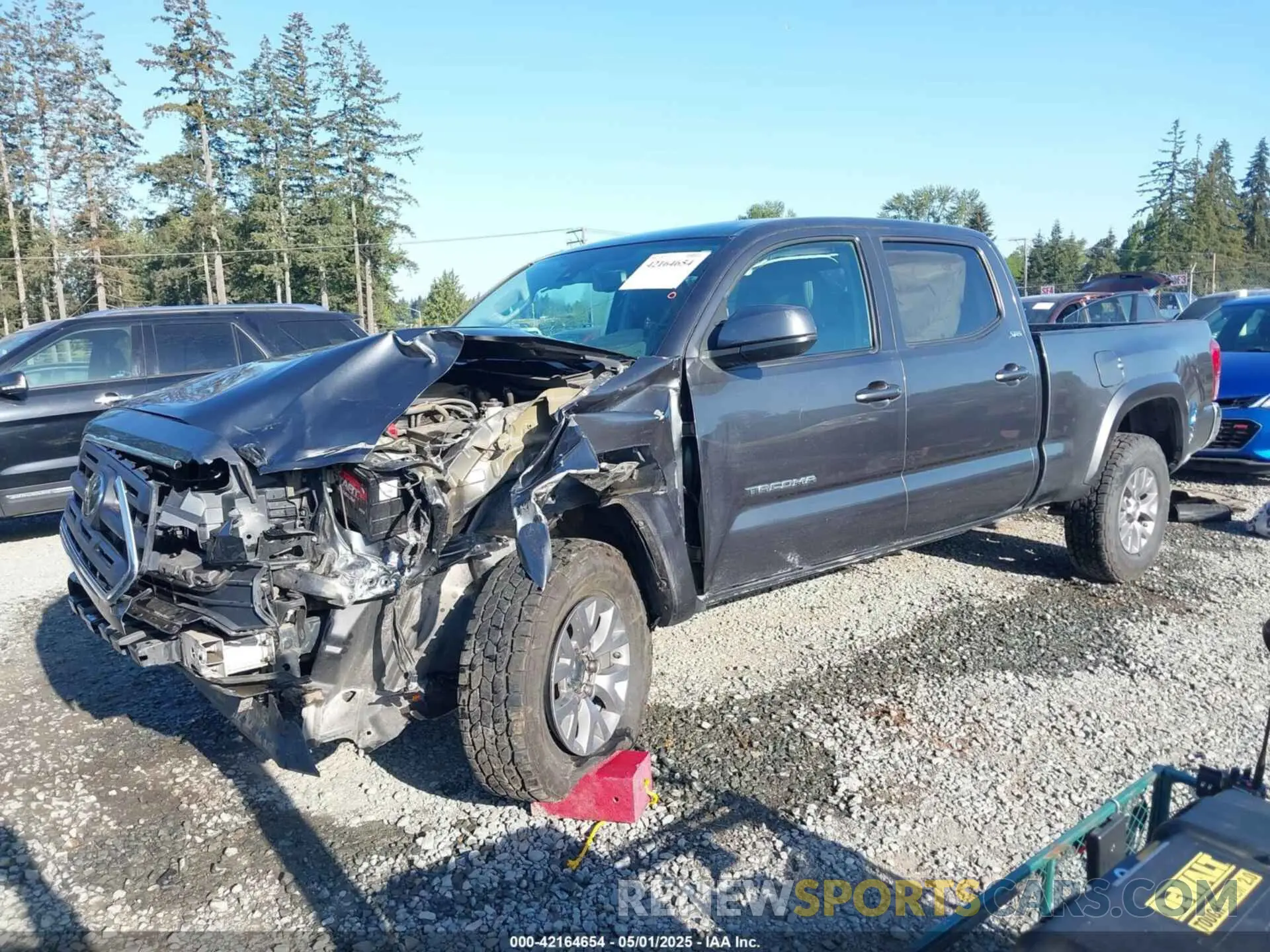 2 fotografías del automóvil dañado 3TMDZ5BN5KM071577 TOYOTA TACOMA 2019