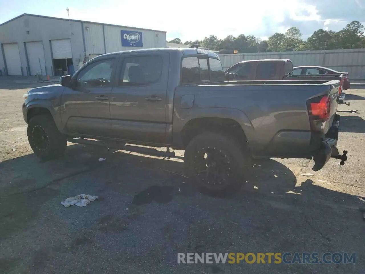 2 fotografías del automóvil dañado 5TFAX5GN3KX142318 TOYOTA TACOMA 2019