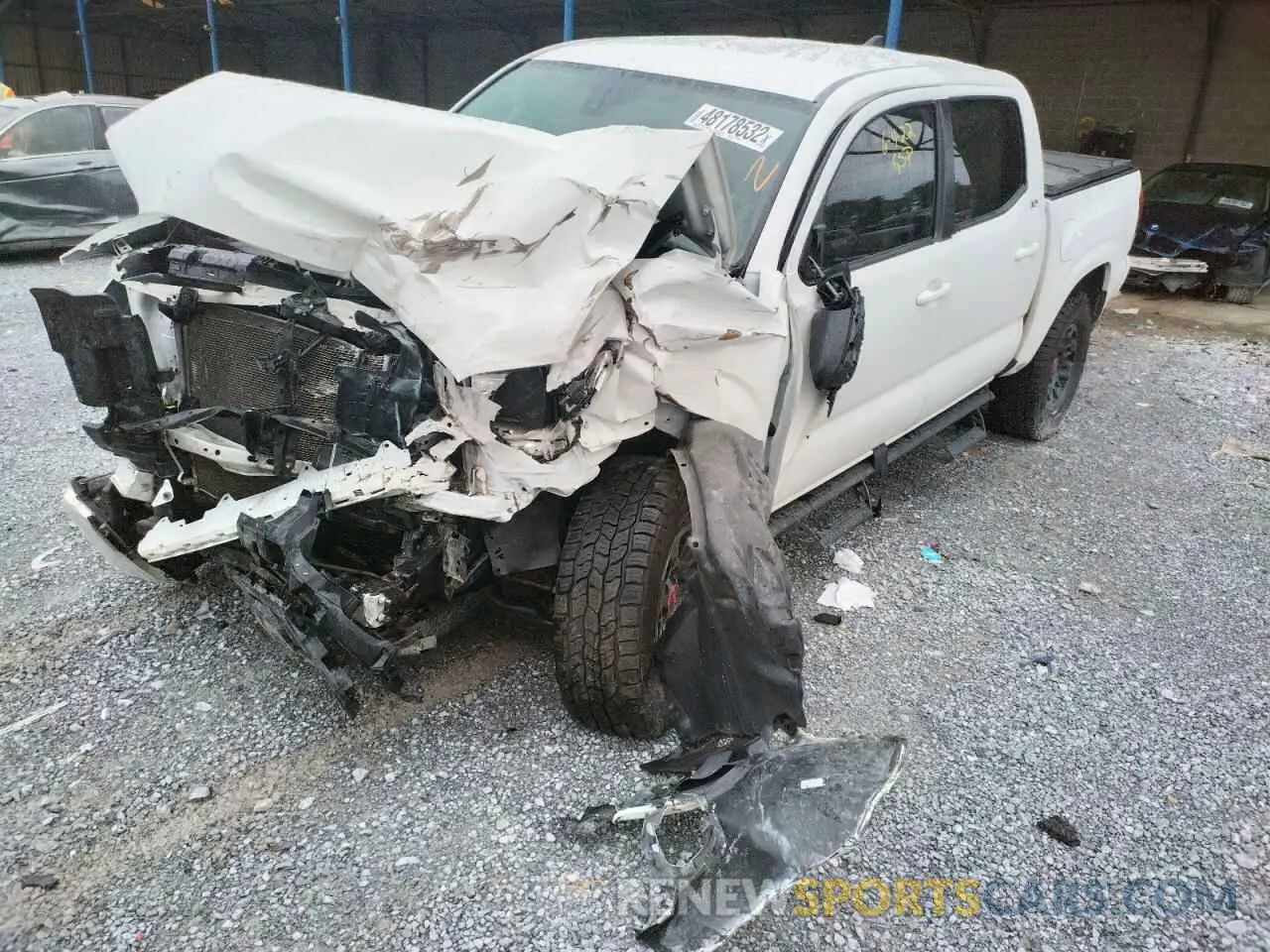 2 fotografías del automóvil dañado 5TFAX5GN9KX159981 TOYOTA TACOMA 2019