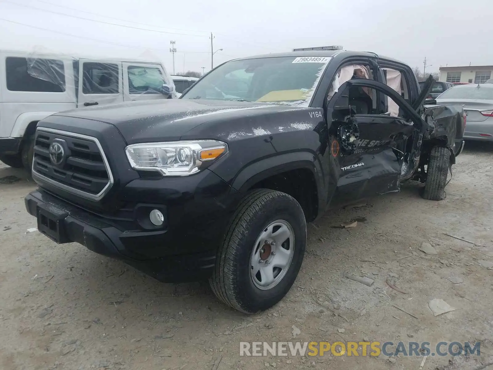 2 fotografías del automóvil dañado 5TFAX5GNXKX153901 TOYOTA TACOMA 2019