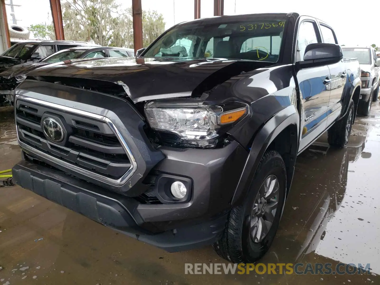 2 fotografías del automóvil dañado 5TFAZ5CN4KX076023 TOYOTA TACOMA 2019