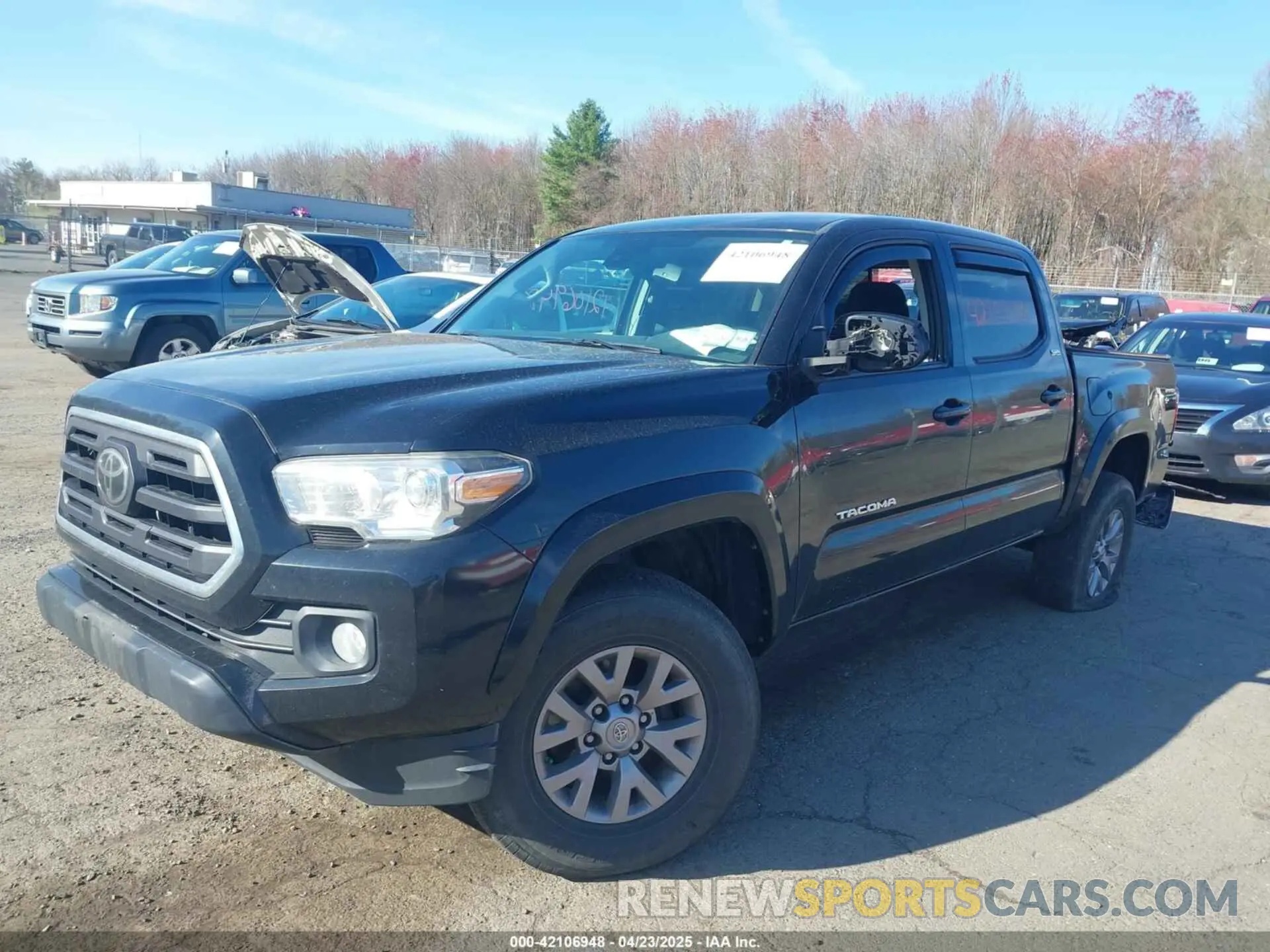 2 fotografías del automóvil dañado 5TFCZ5AN0KX195134 TOYOTA TACOMA 2019