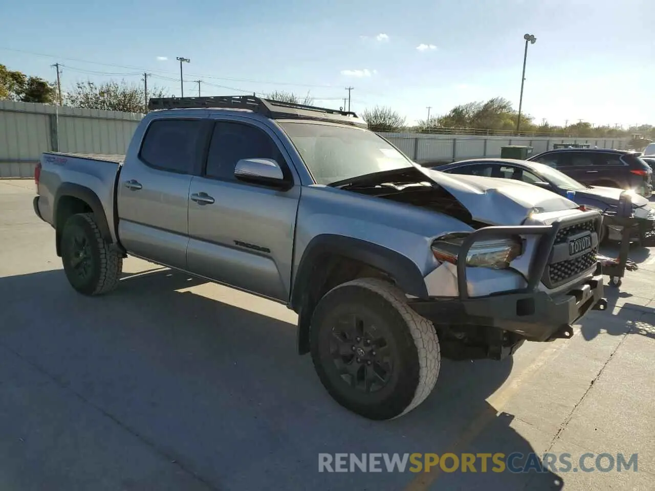 4 fotografías del automóvil dañado 5TFCZ5AN7KX198600 TOYOTA TACOMA 2019