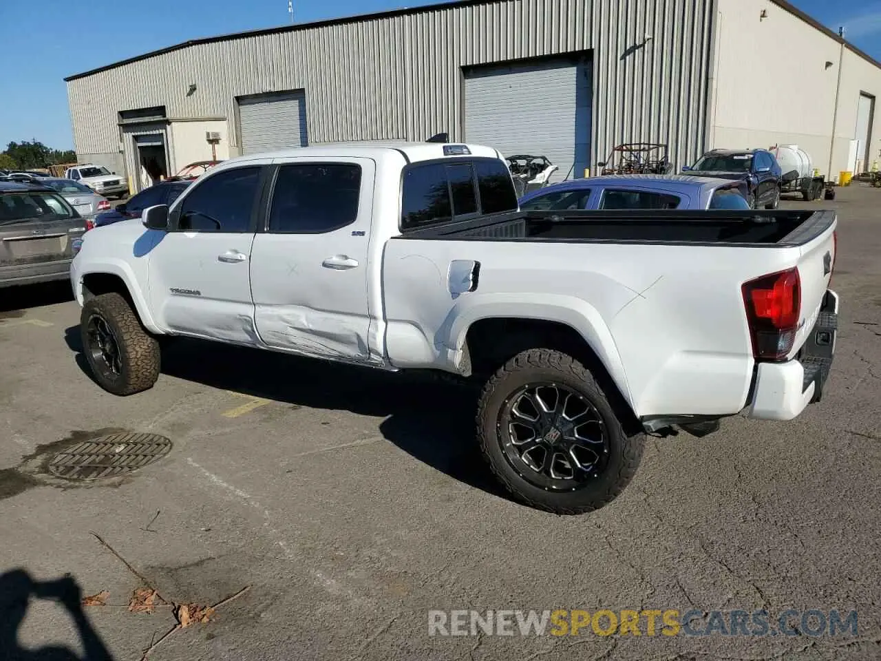 2 fotografías del automóvil dañado 5TFDZ5BN4KX044980 TOYOTA TACOMA 2019