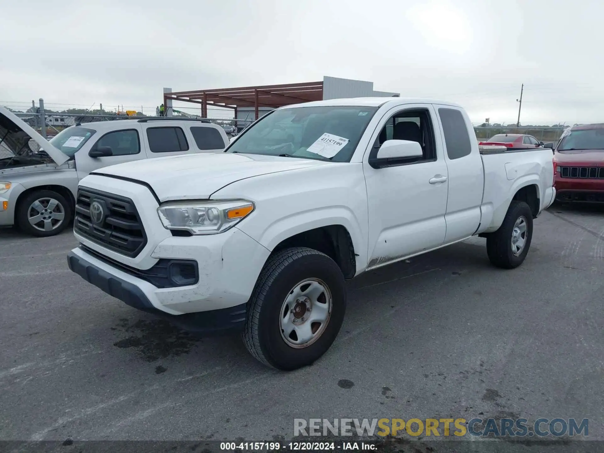 2 fotografías del automóvil dañado 5TFRZ5CN2KX084656 TOYOTA TACOMA 2019