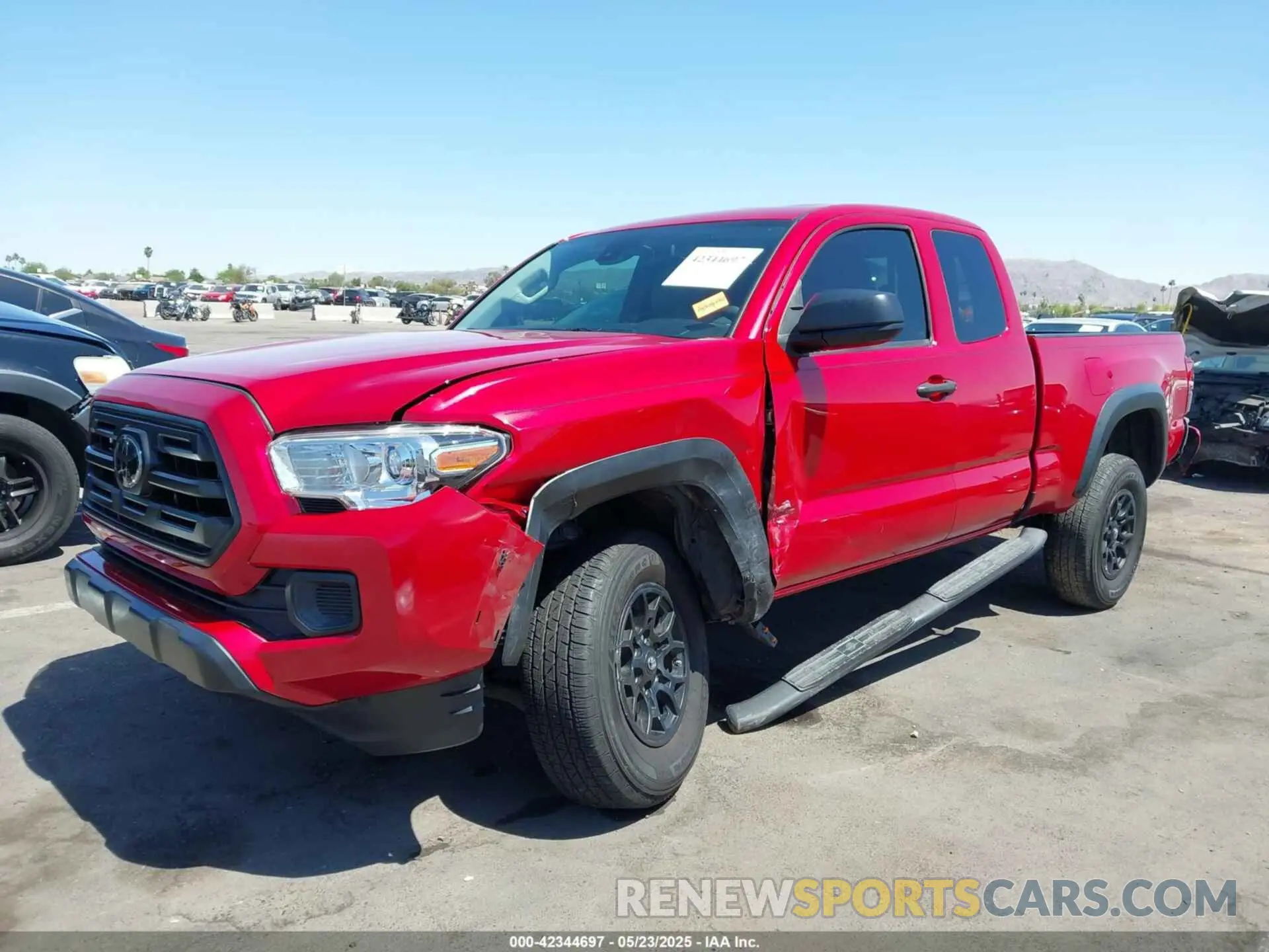 2 fotografías del automóvil dañado 5TFRZ5CN9KX081124 TOYOTA TACOMA 2019