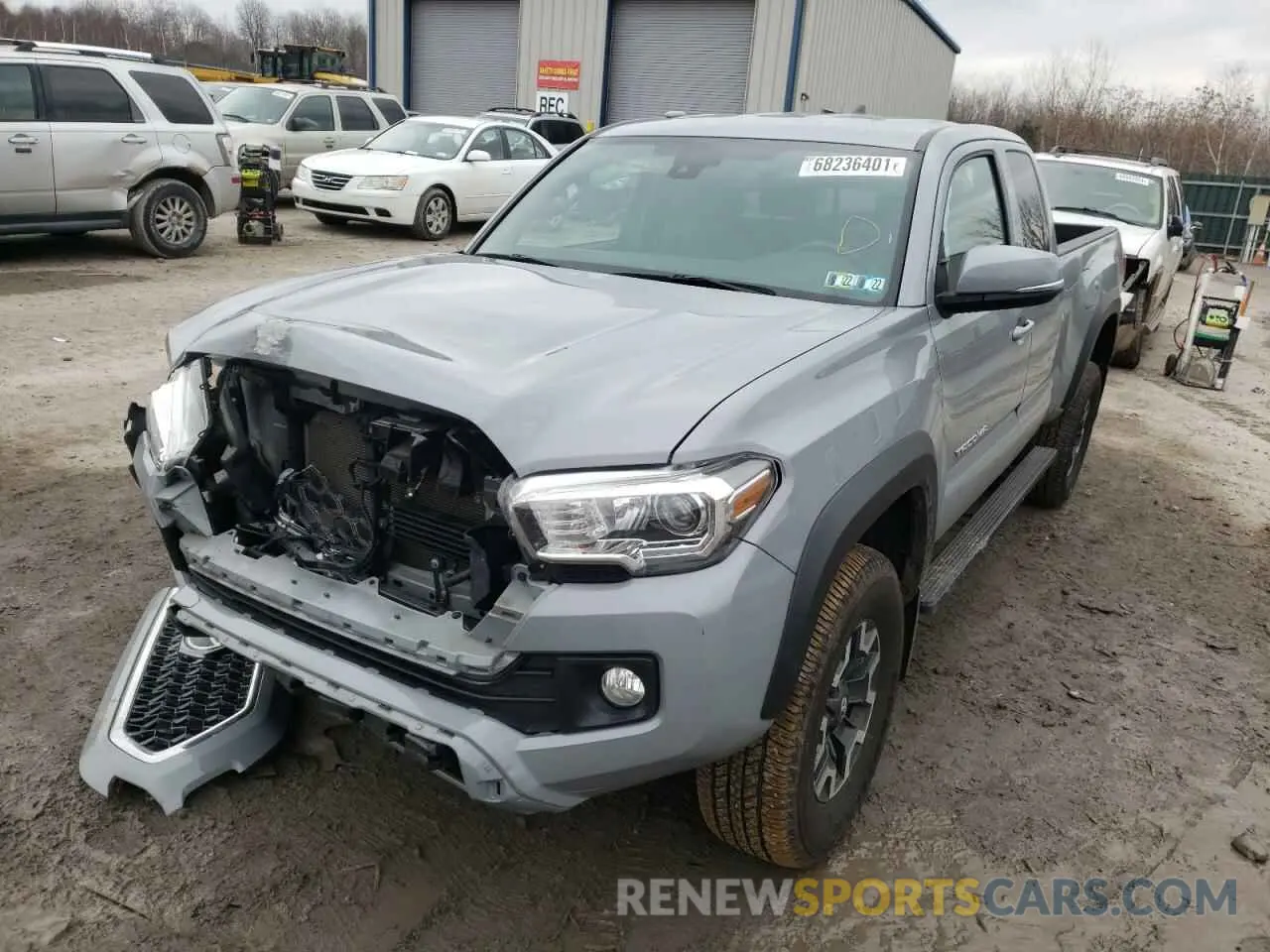 2 fotografías del automóvil dañado 5TFSZ5AN3KX191302 TOYOTA TACOMA 2019