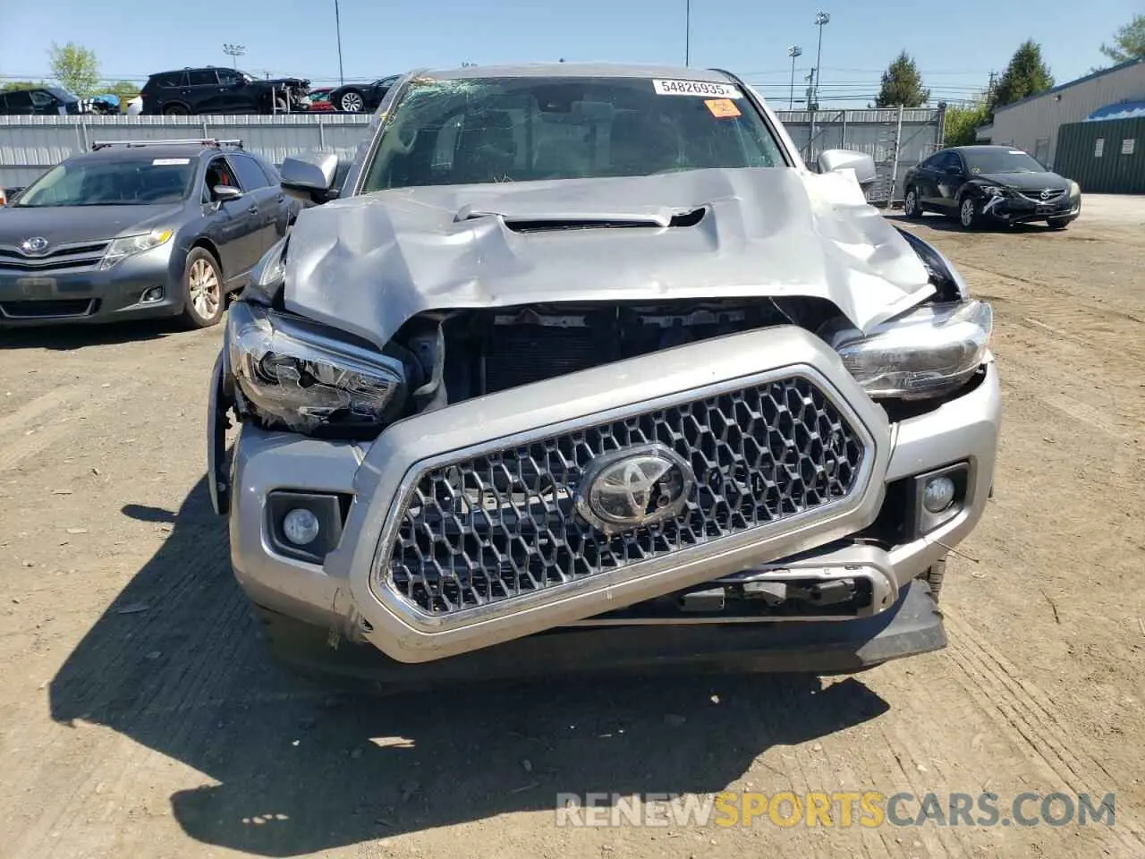 5 fotografías del automóvil dañado 5TFSZ5AN3KX205733 TOYOTA TACOMA 2019