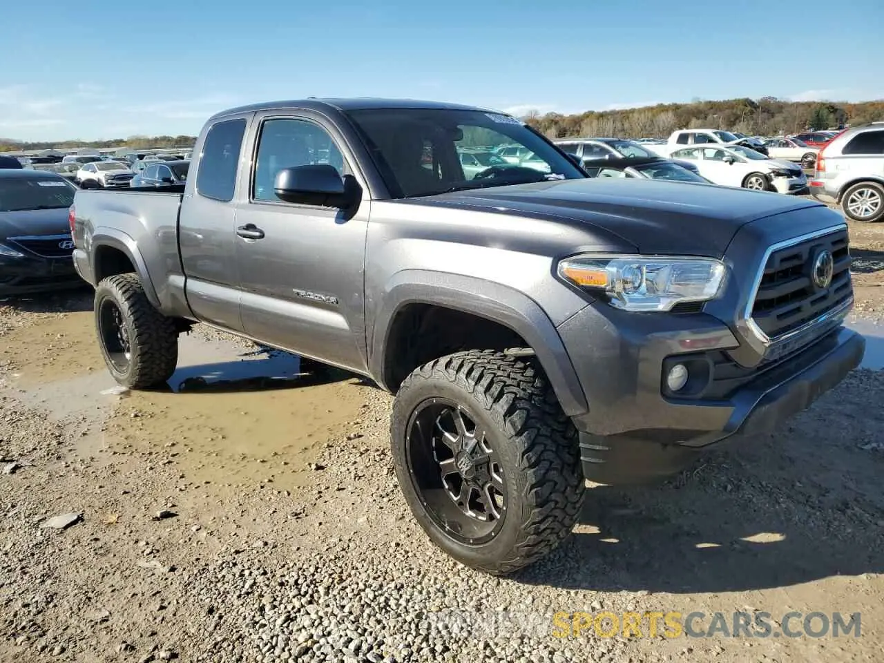 4 fotografías del automóvil dañado 5TFSZ5AN9KX200780 TOYOTA TACOMA 2019
