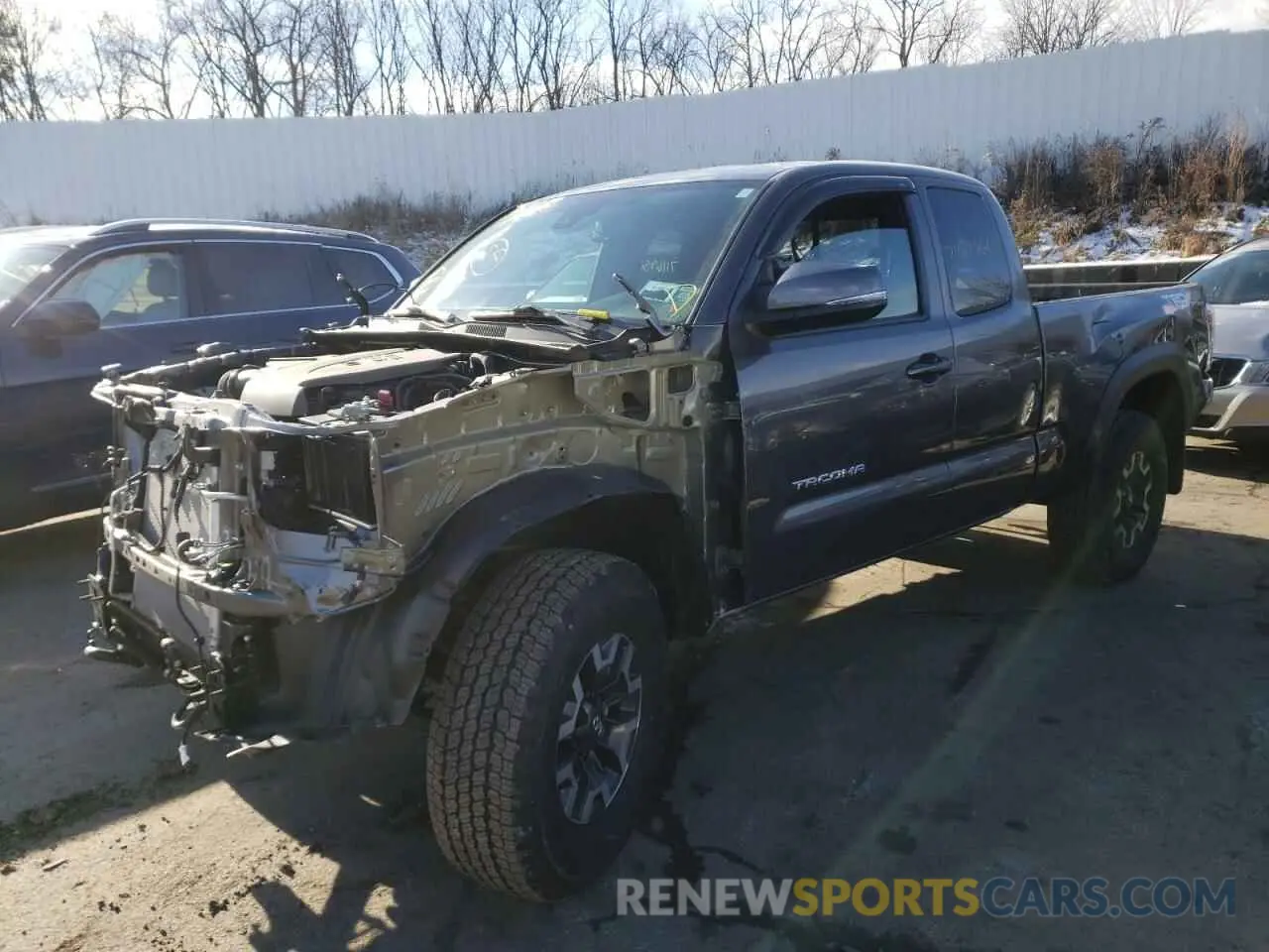 2 fotografías del automóvil dañado 5TFSZ5AN5LX221594 TOYOTA TACOMA 2020