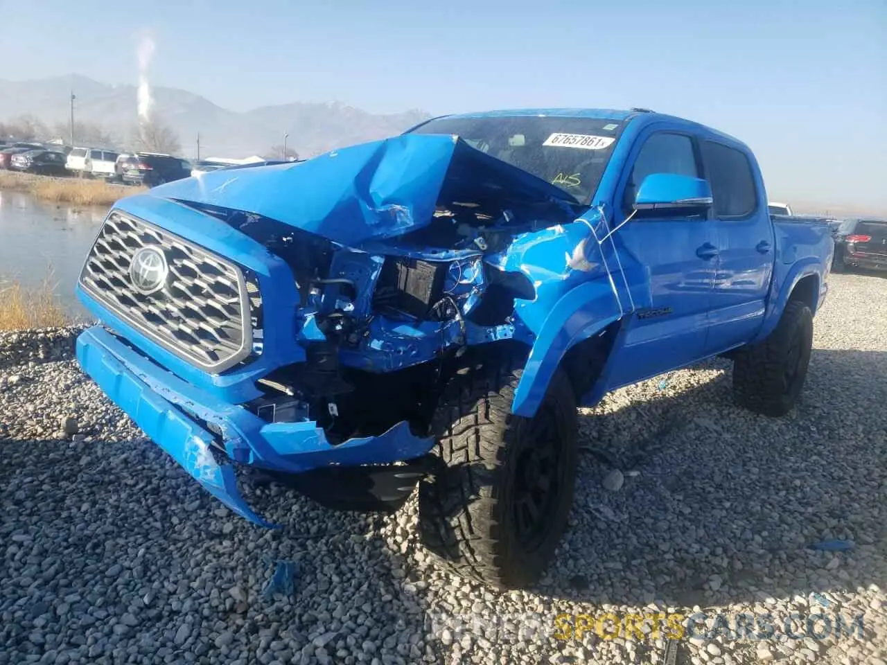 2 fotografías del automóvil dañado 3TMCZ5AN4MM429512 TOYOTA TACOMA 2021