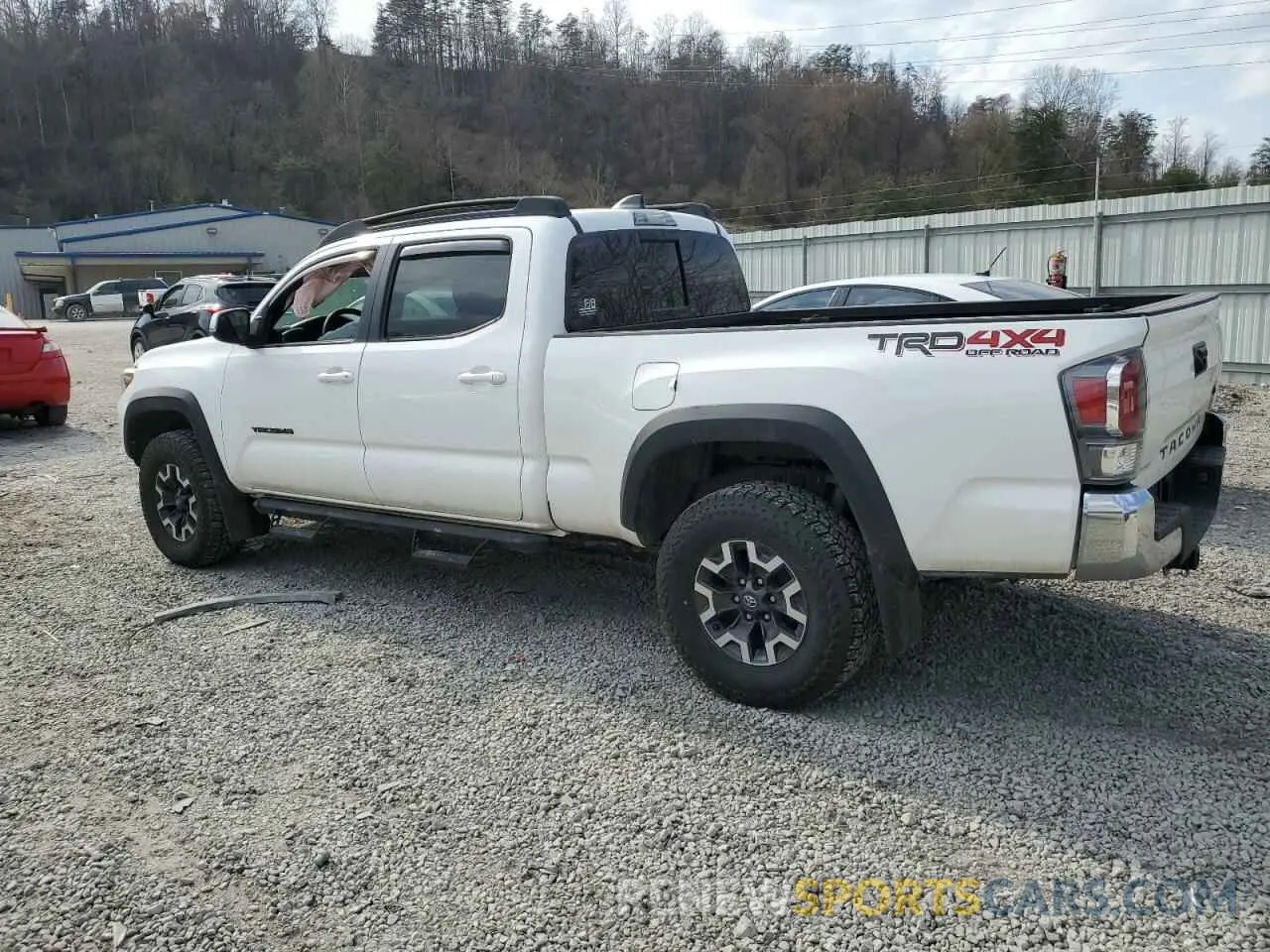 2 fotografías del automóvil dañado 3TMDZ5BN4MM112574 TOYOTA TACOMA 2021