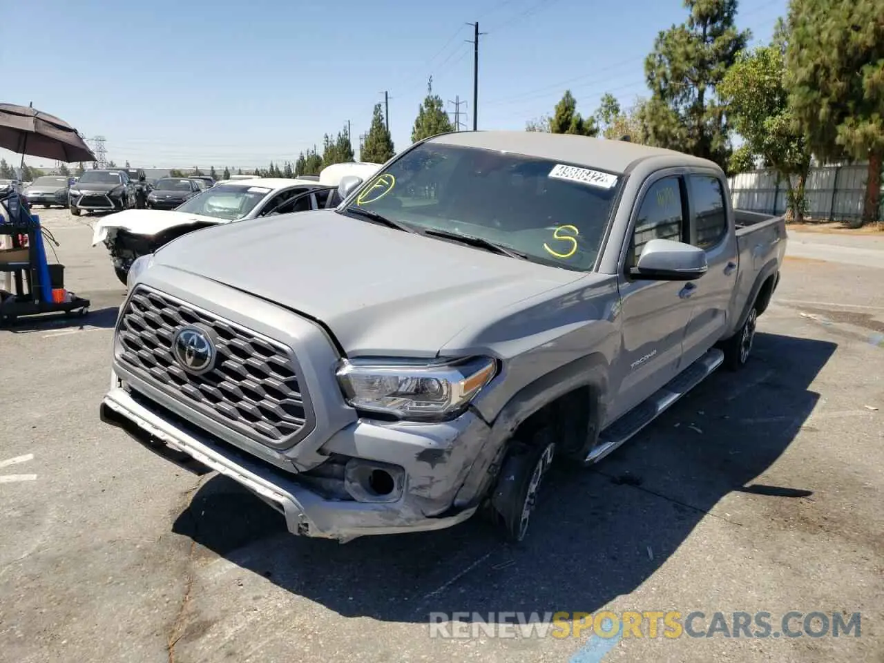 2 fotografías del automóvil dañado 3TMDZ5BN9MM108116 TOYOTA TACOMA 2021