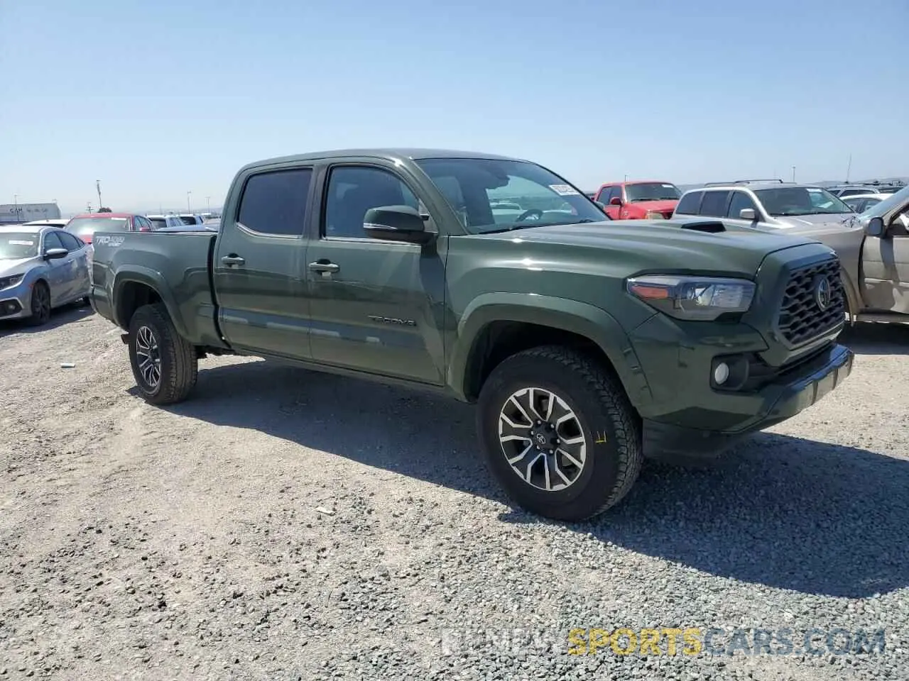 4 fotografías del automóvil dañado 3TMDZ5BN9MM115678 TOYOTA TACOMA 2021