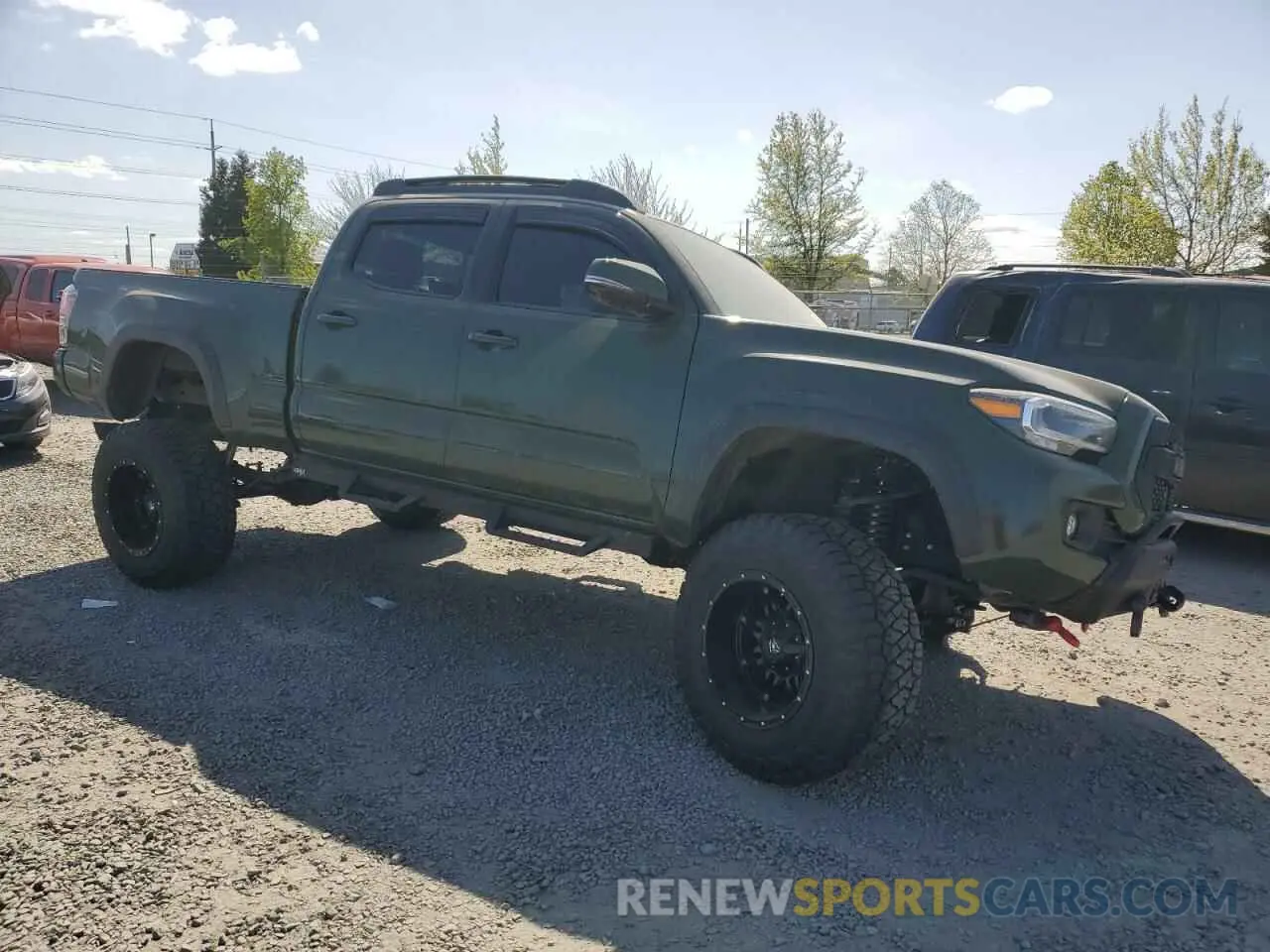 4 fotografías del automóvil dañado 3TMDZ5BN9MM116619 TOYOTA TACOMA 2021
