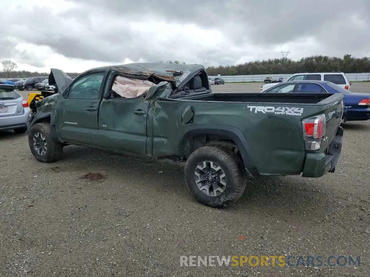 2 fotografías del automóvil dañado 3TMDZ5BNXMM099474 TOYOTA TACOMA 2021