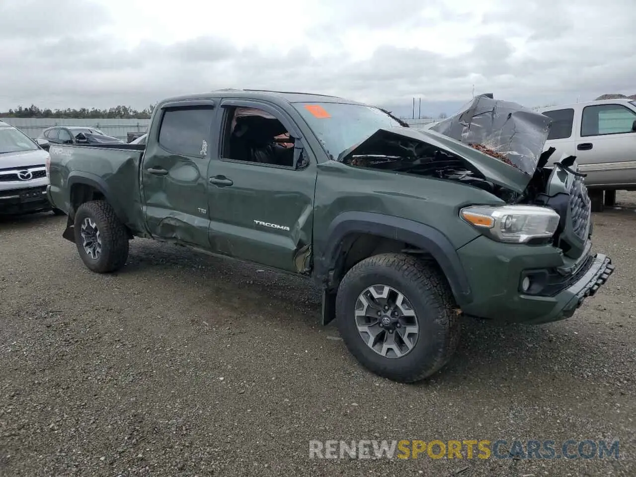 4 fotografías del automóvil dañado 3TMDZ5BNXMM099474 TOYOTA TACOMA 2021