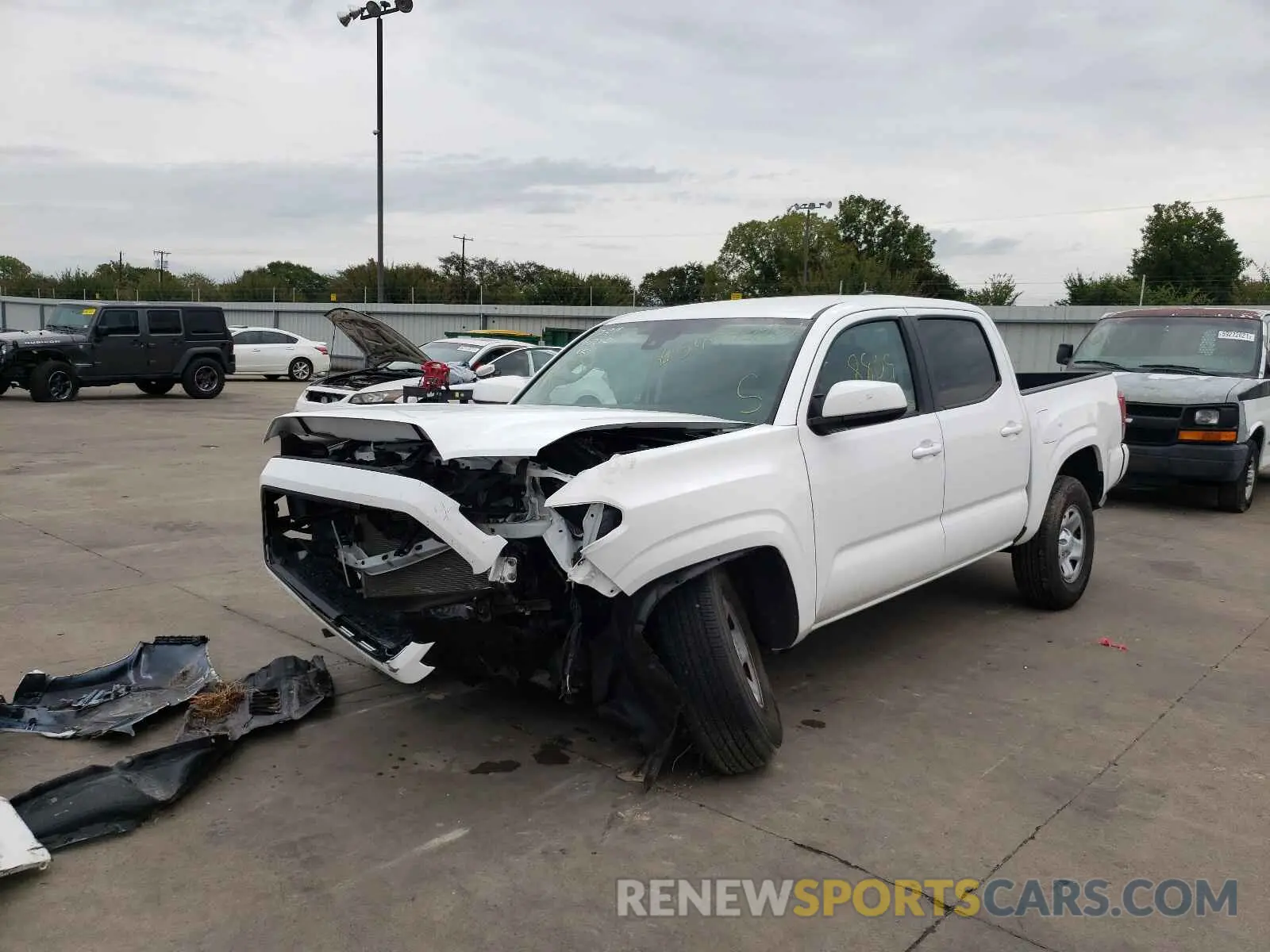 2 fotografías del automóvil dañado 5TFAX5GN3MX193742 TOYOTA TACOMA 2021