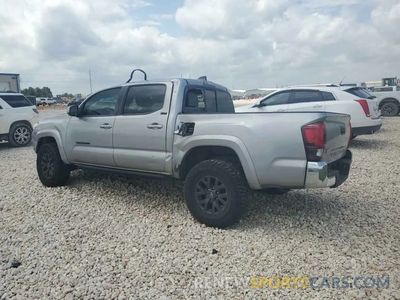 2 fotografías del automóvil dañado 5TFAX5GN5MX192513 TOYOTA TACOMA 2021