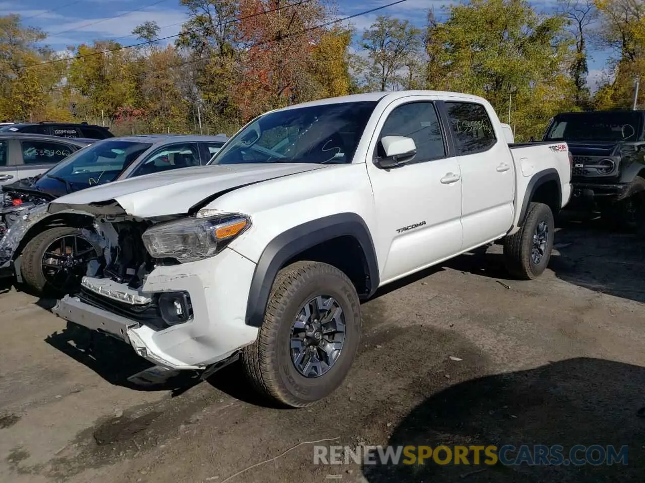 2 fotografías del automóvil dañado 5TFCZ5AN0MX274662 TOYOTA TACOMA 2021