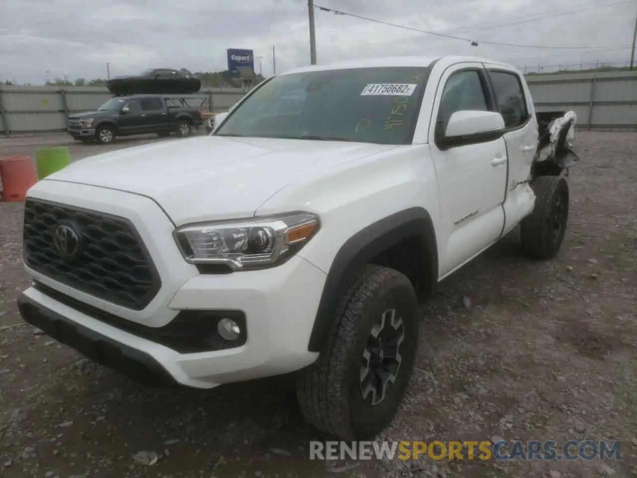 2 fotografías del automóvil dañado 5TFCZ5AN3MX255216 TOYOTA TACOMA 2021
