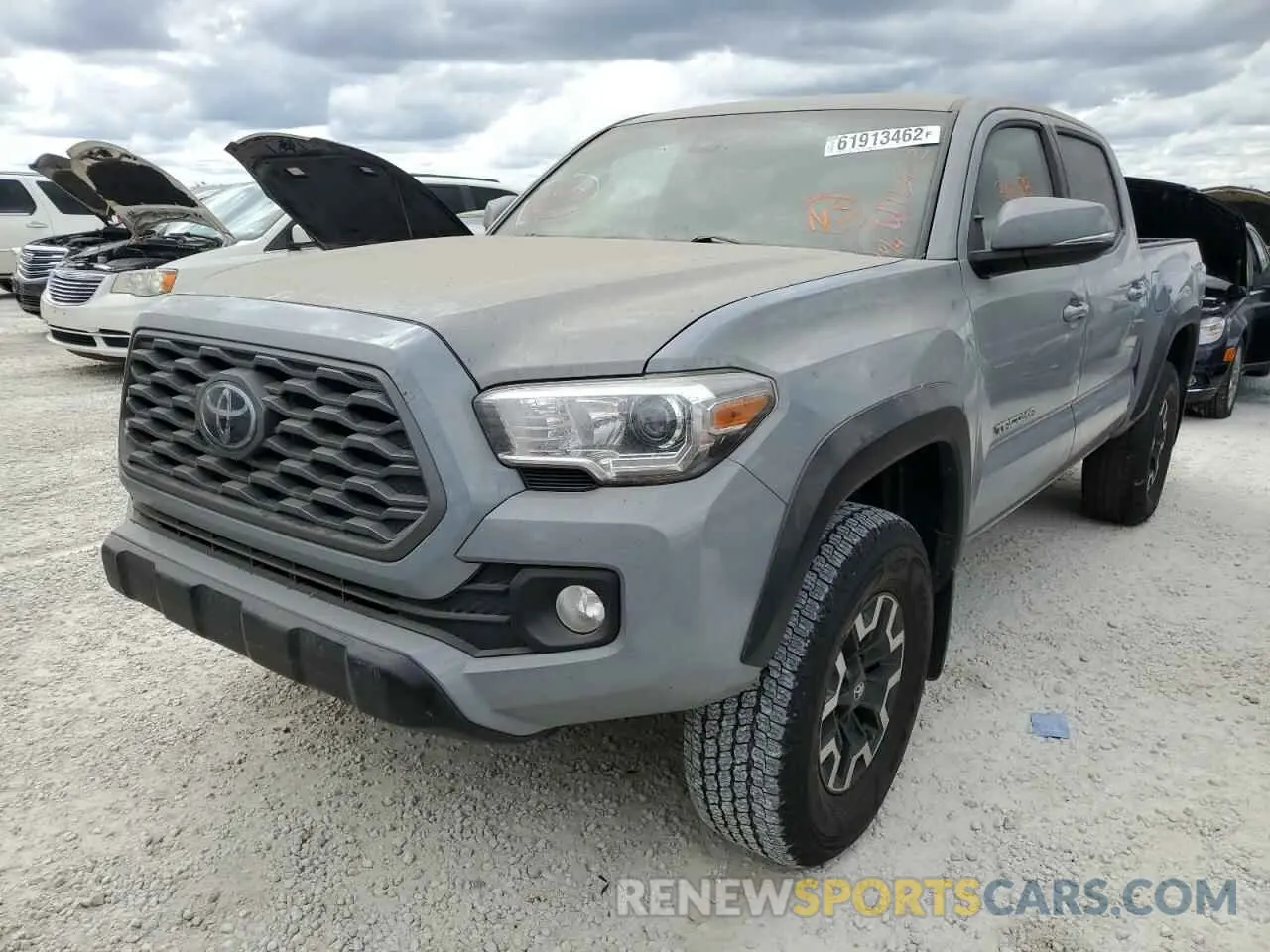 2 fotografías del automóvil dañado 5TFCZ5AN6MX255923 TOYOTA TACOMA 2021