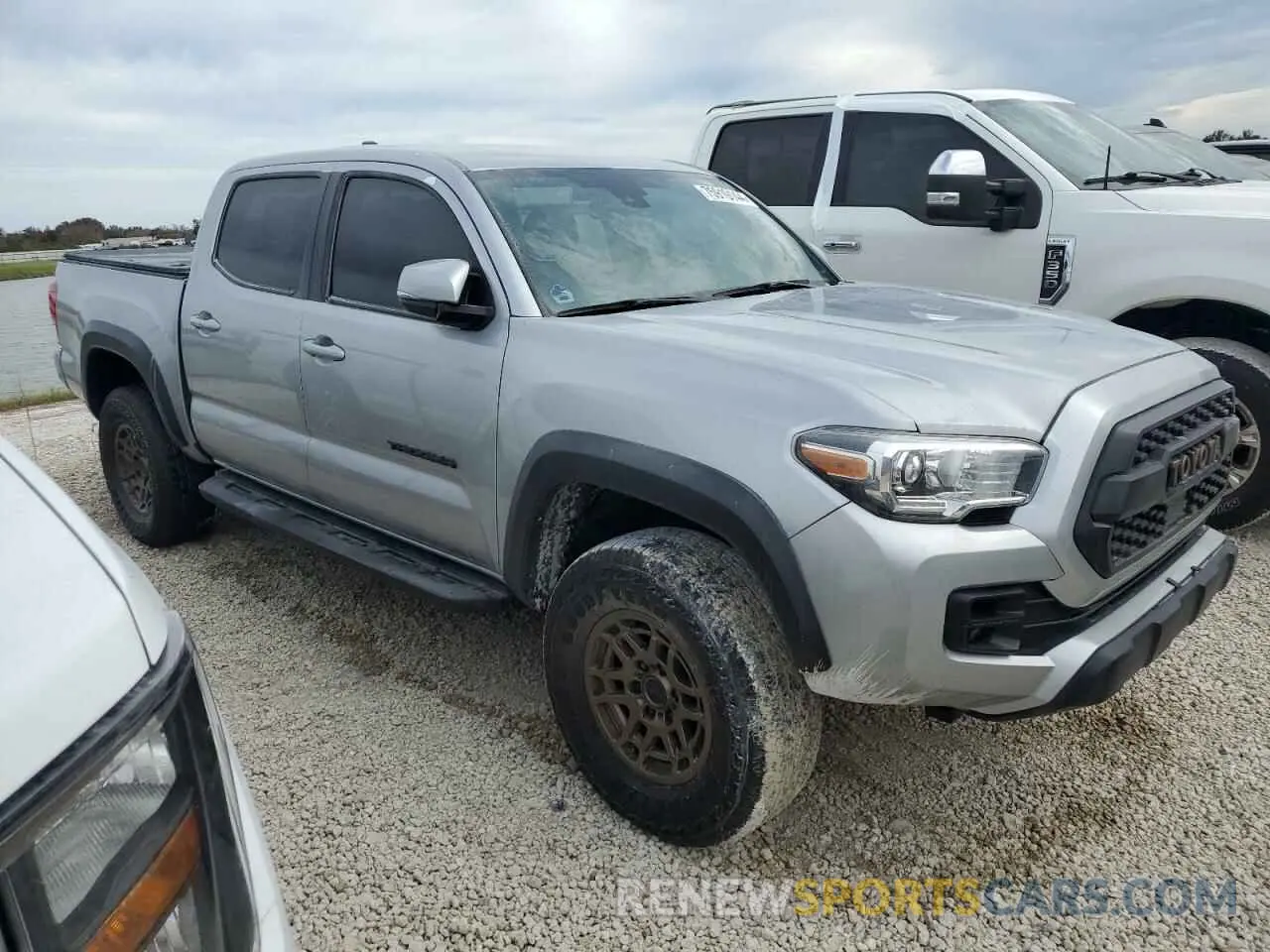 4 fotografías del automóvil dañado 3TMAZ5CN2NM160528 TOYOTA TACOMA 2022
