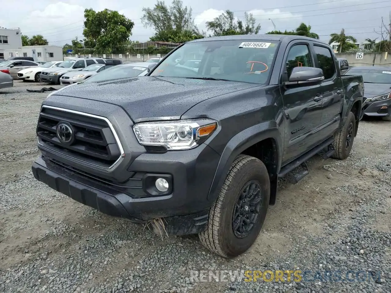 2 fotografías del automóvil dañado 3TMAZ5CN2NM187311 TOYOTA TACOMA 2022