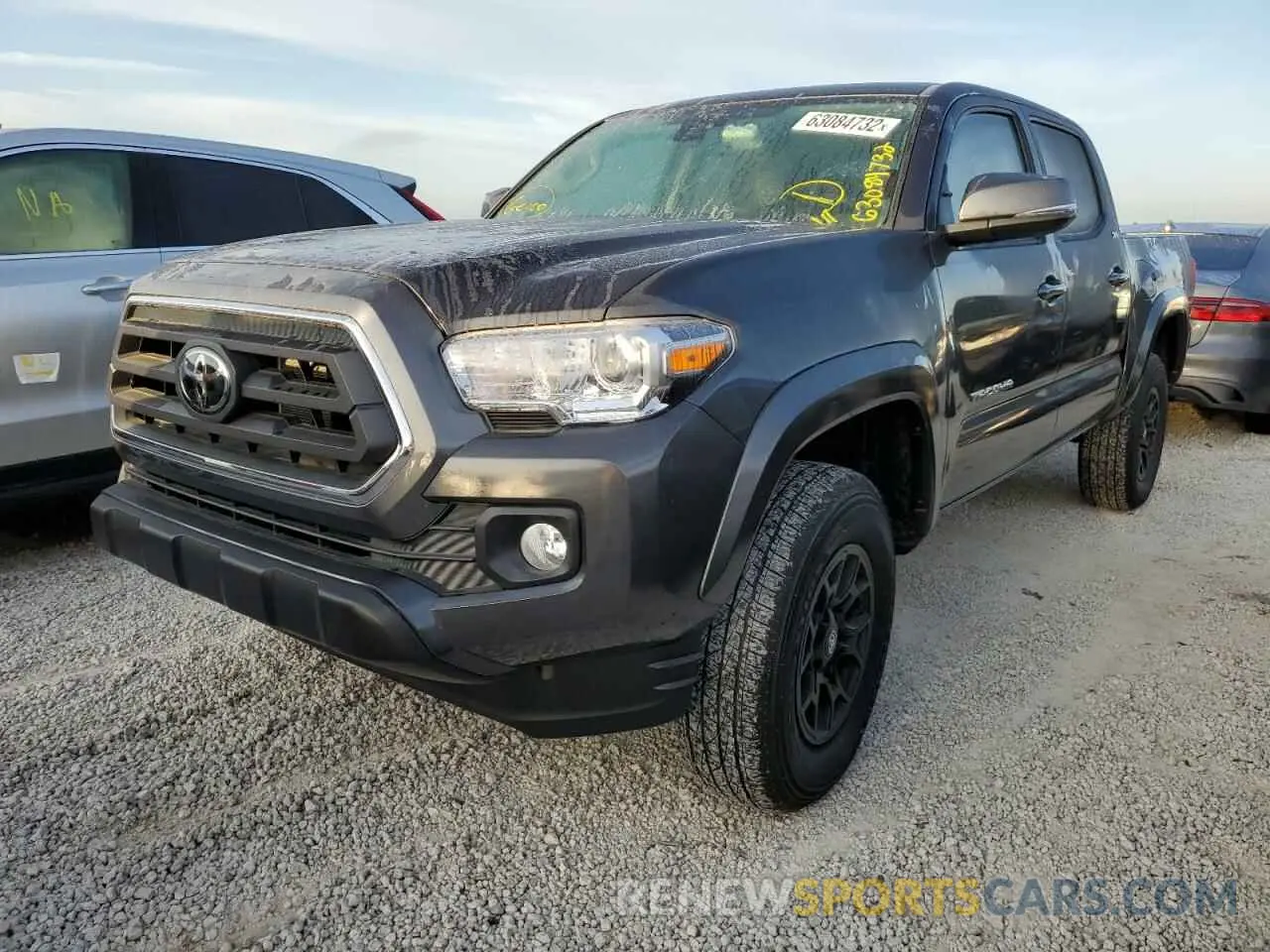 2 fotografías del automóvil dañado 3TMAZ5CN4NM186922 TOYOTA TACOMA 2022