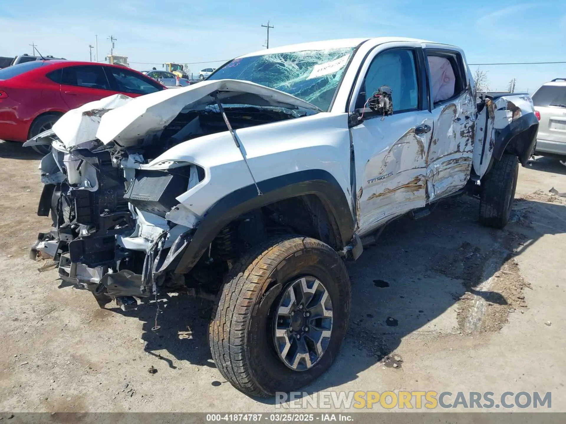 2 fotografías del automóvil dañado 3TMCZ5AN0NM499428 TOYOTA TACOMA 2022