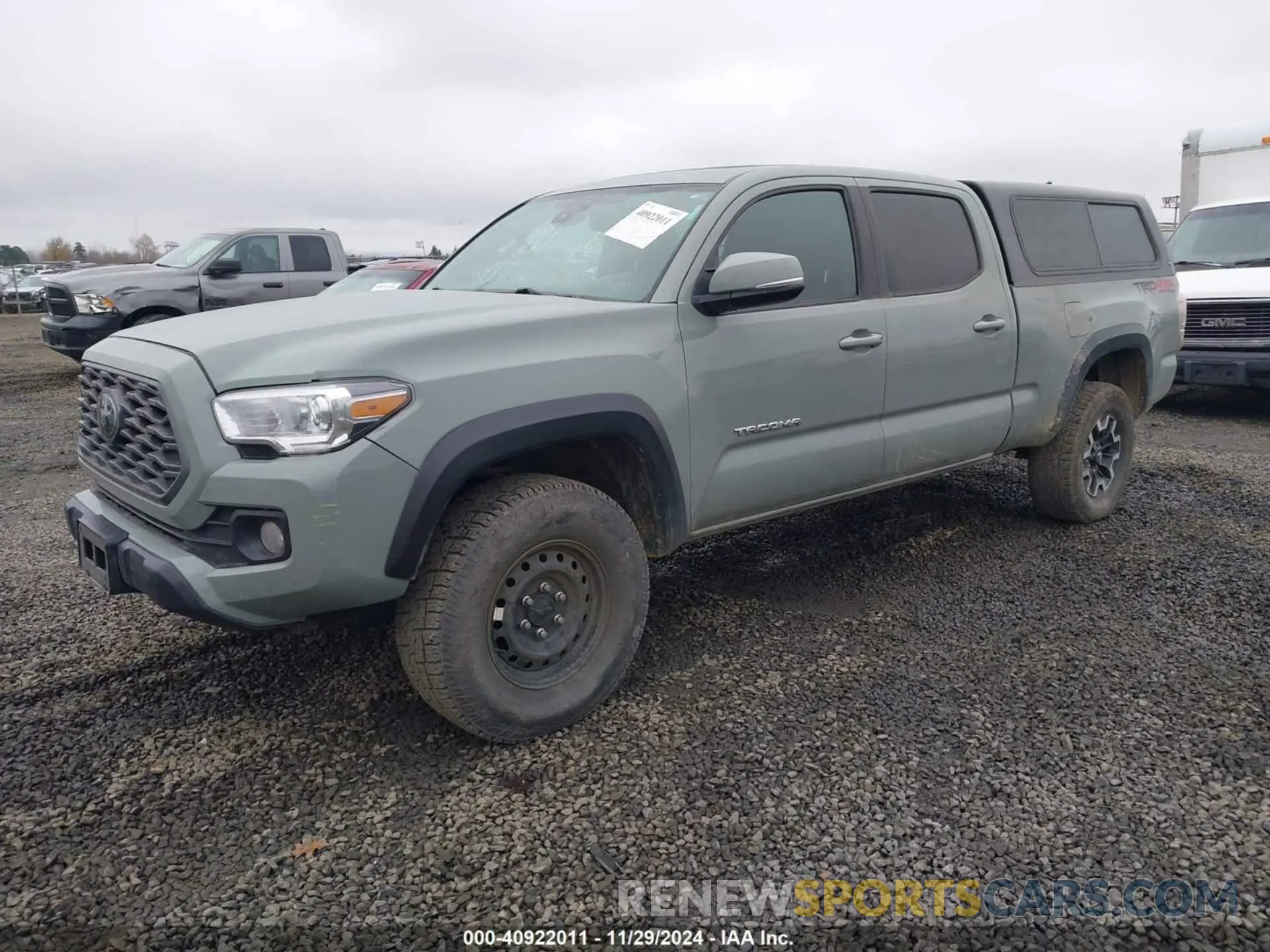 2 fotografías del automóvil dañado 3TMDZ5BN1NM123131 TOYOTA TACOMA 2022