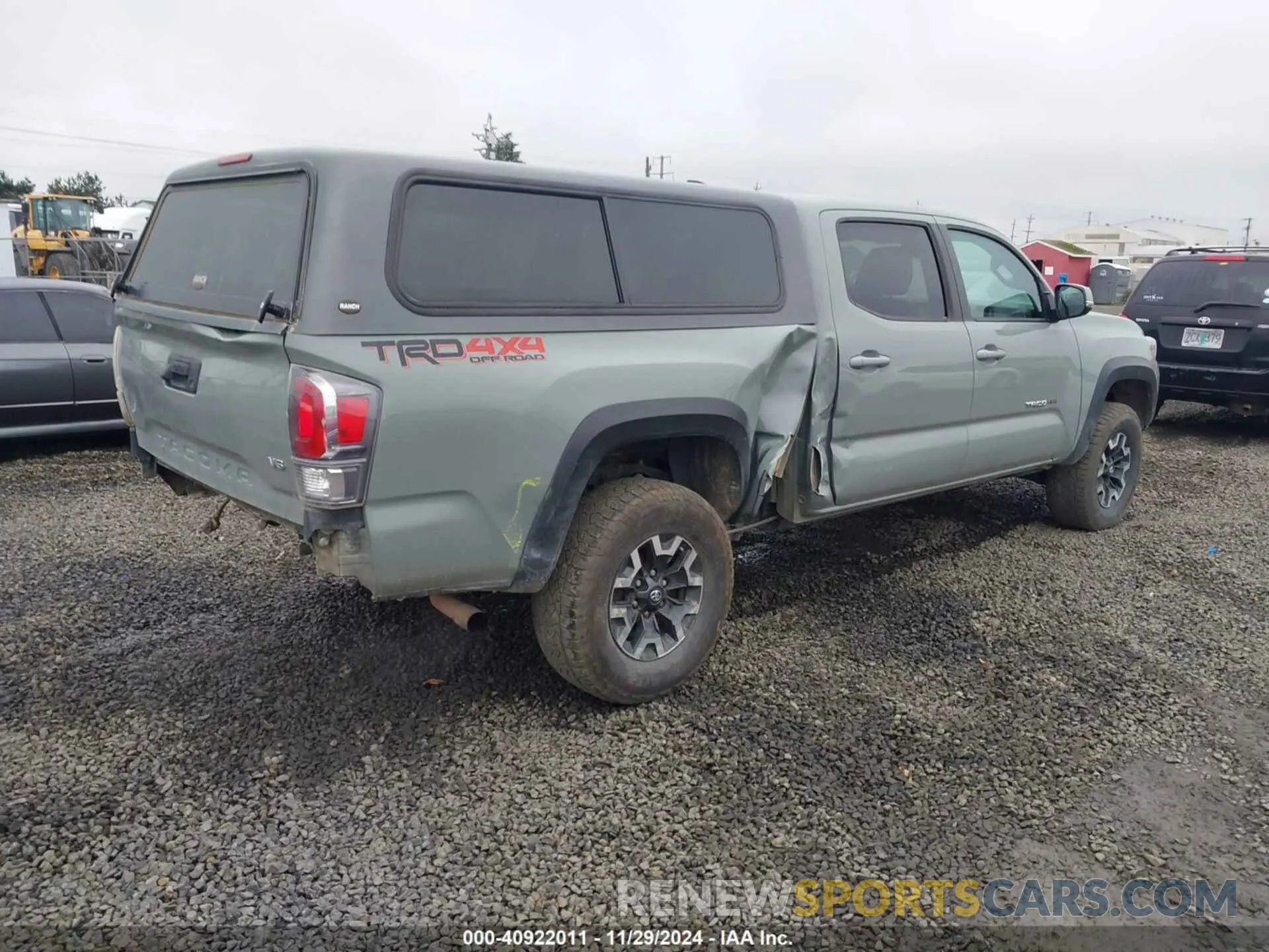4 fotografías del automóvil dañado 3TMDZ5BN1NM123131 TOYOTA TACOMA 2022