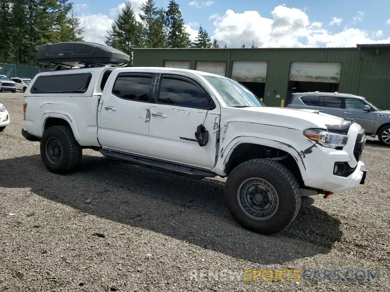 4 fotografías del automóvil dañado 3TMDZ5BN1NM136395 TOYOTA TACOMA 2022