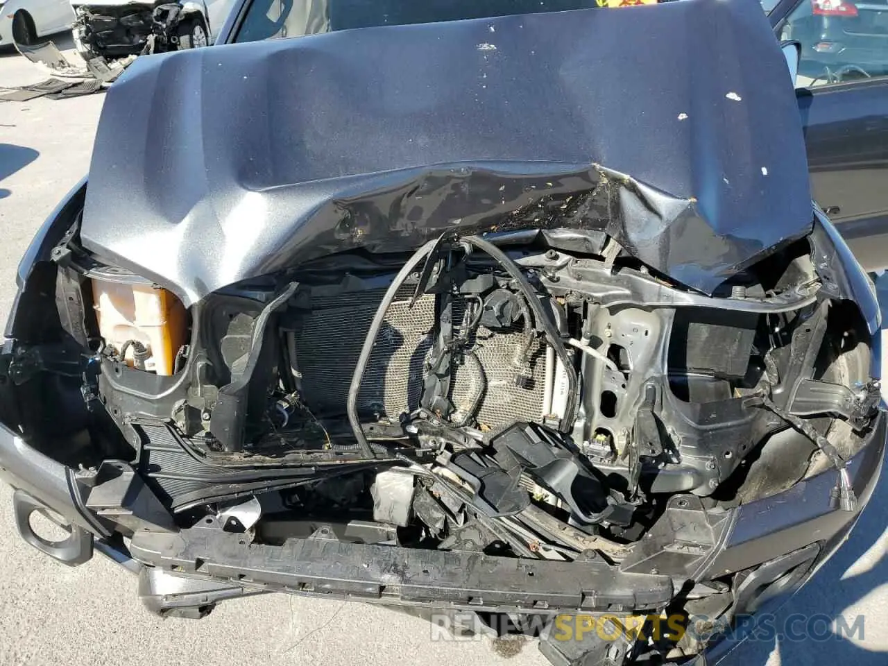 11 fotografías del automóvil dañado 3TMDZ5BN3NM135717 TOYOTA TACOMA 2022