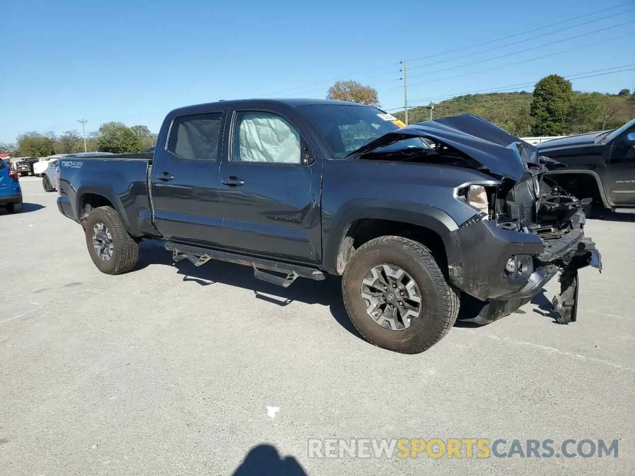 4 fotografías del automóvil dañado 3TMDZ5BN3NM135717 TOYOTA TACOMA 2022