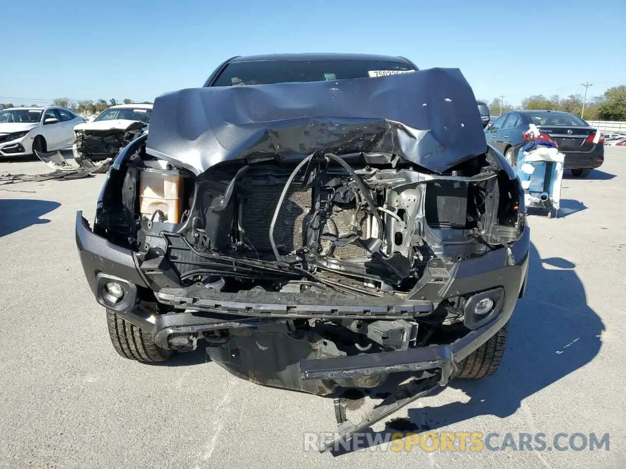 5 fotografías del automóvil dañado 3TMDZ5BN3NM135717 TOYOTA TACOMA 2022