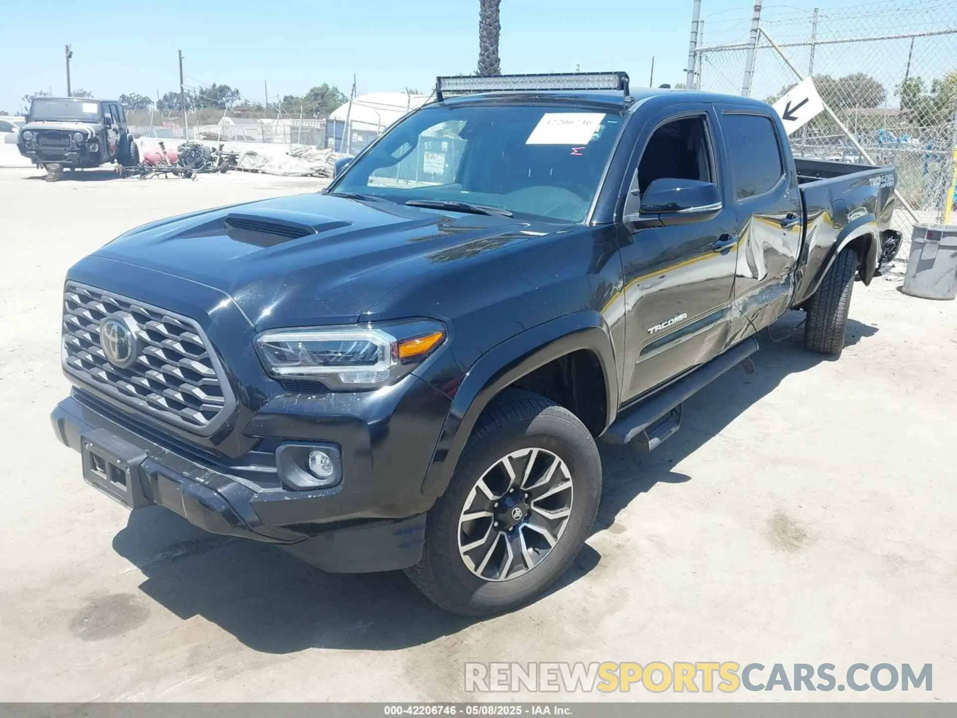 2 fotografías del automóvil dañado 3TMDZ5BN6NM123917 TOYOTA TACOMA 2022
