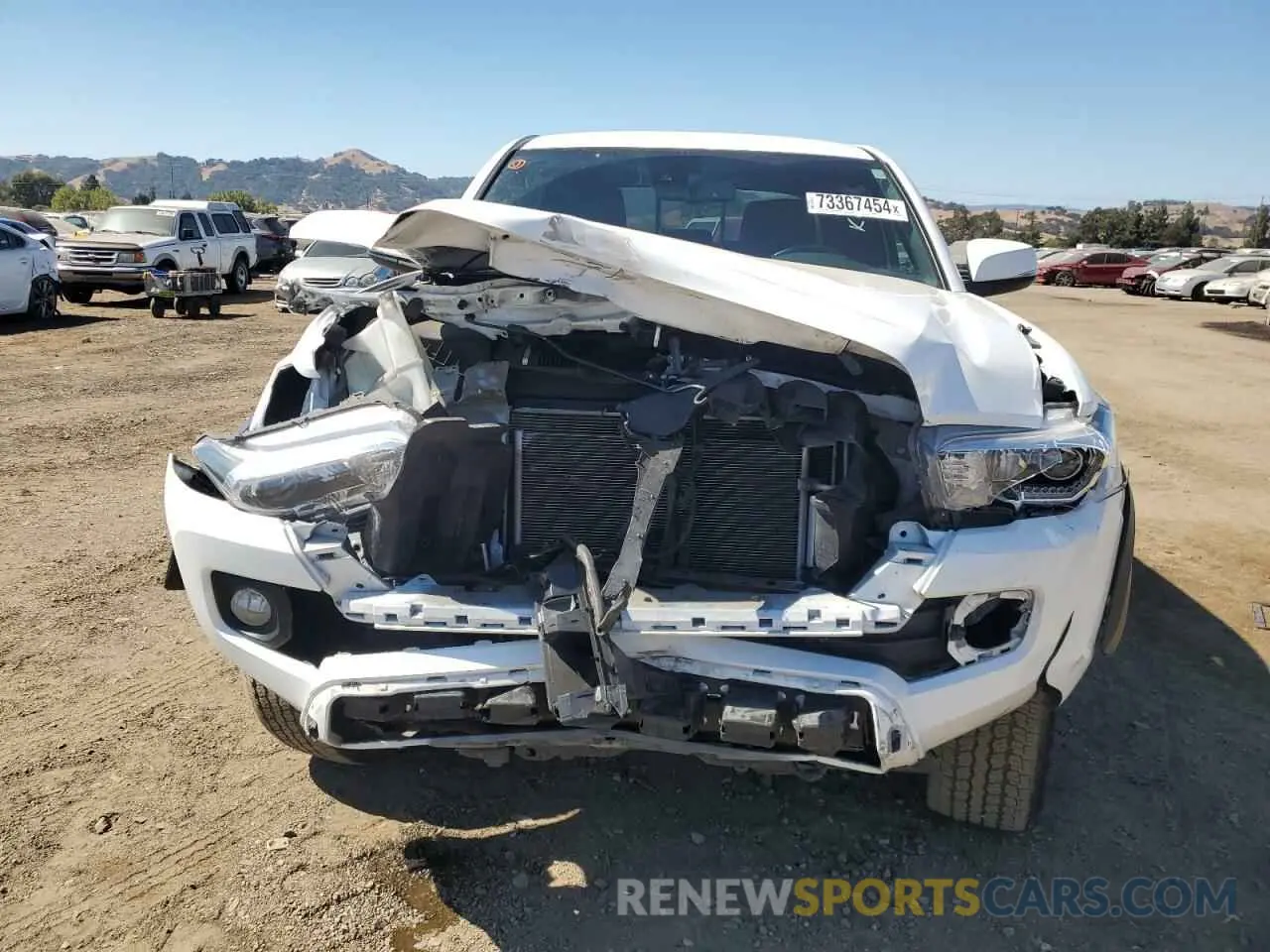 5 fotografías del automóvil dañado 3TMDZ5BNXNM131387 TOYOTA TACOMA 2022