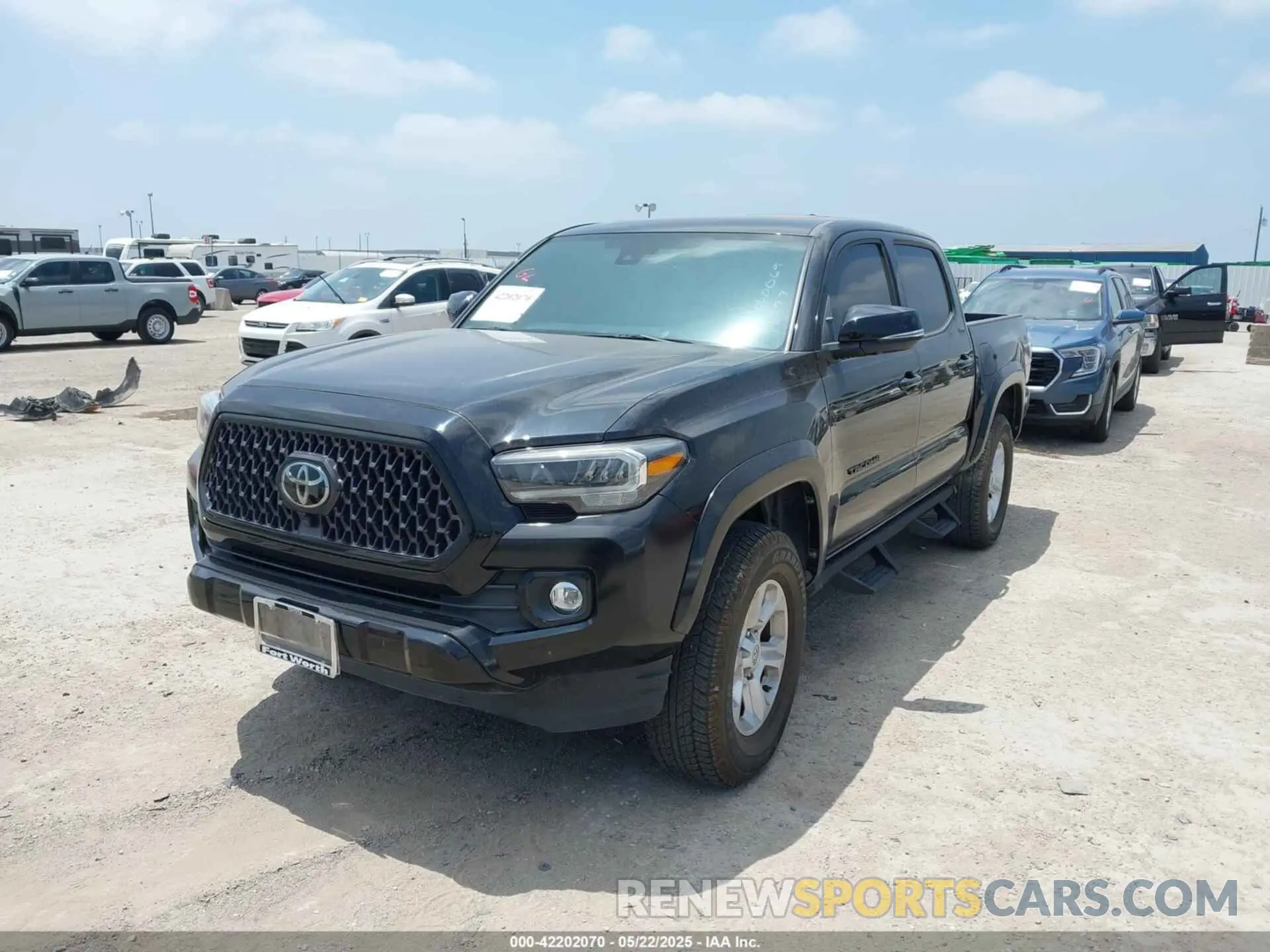 2 fotografías del automóvil dañado 3TMEZ5CN0NM173523 TOYOTA TACOMA 2022